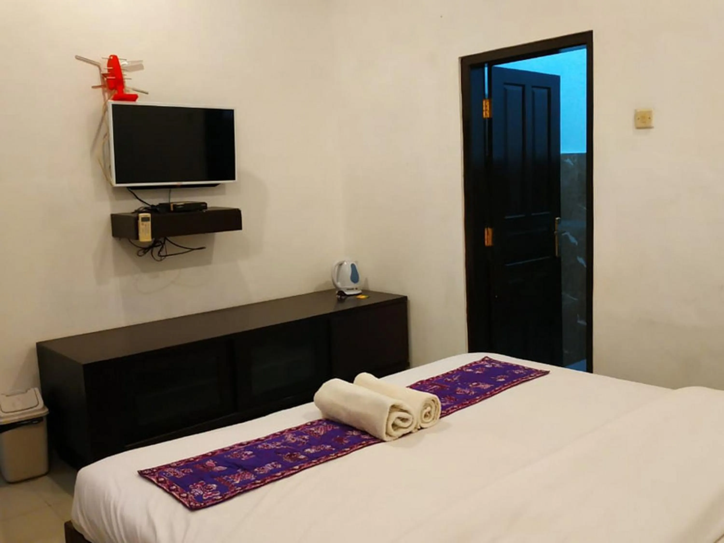 Bed in Alam Jogja Resort Mitra RedDoorz