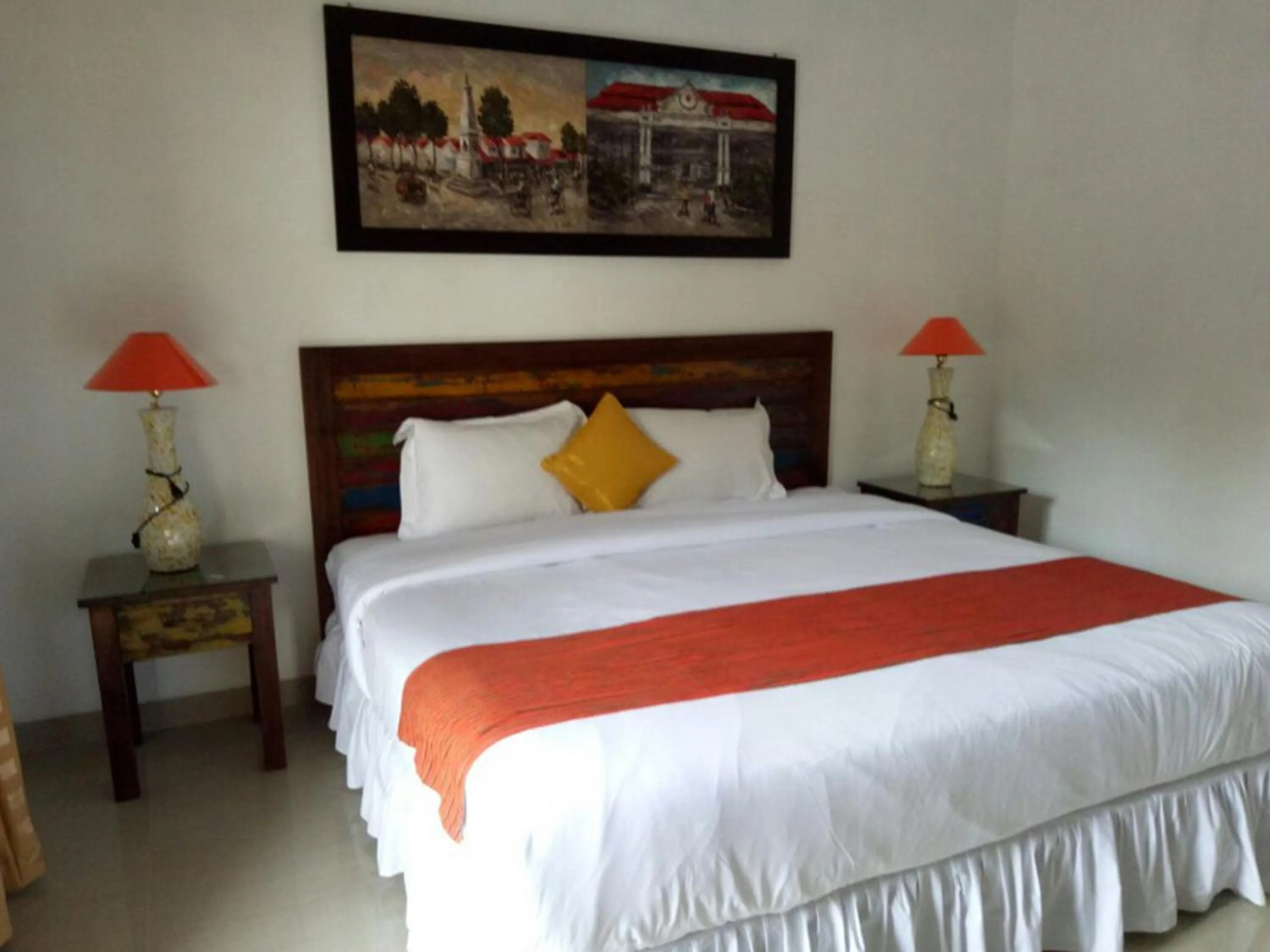 Bed in Alam Jogja Resort Mitra RedDoorz