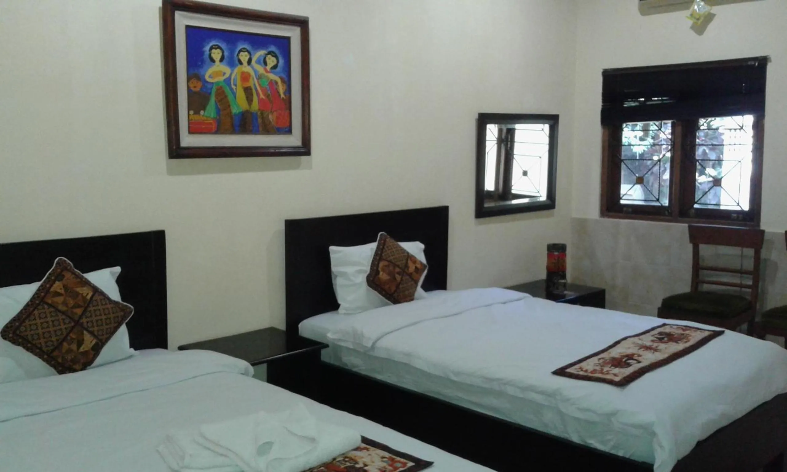 Bed in Alam Jogja Resort Mitra RedDoorz