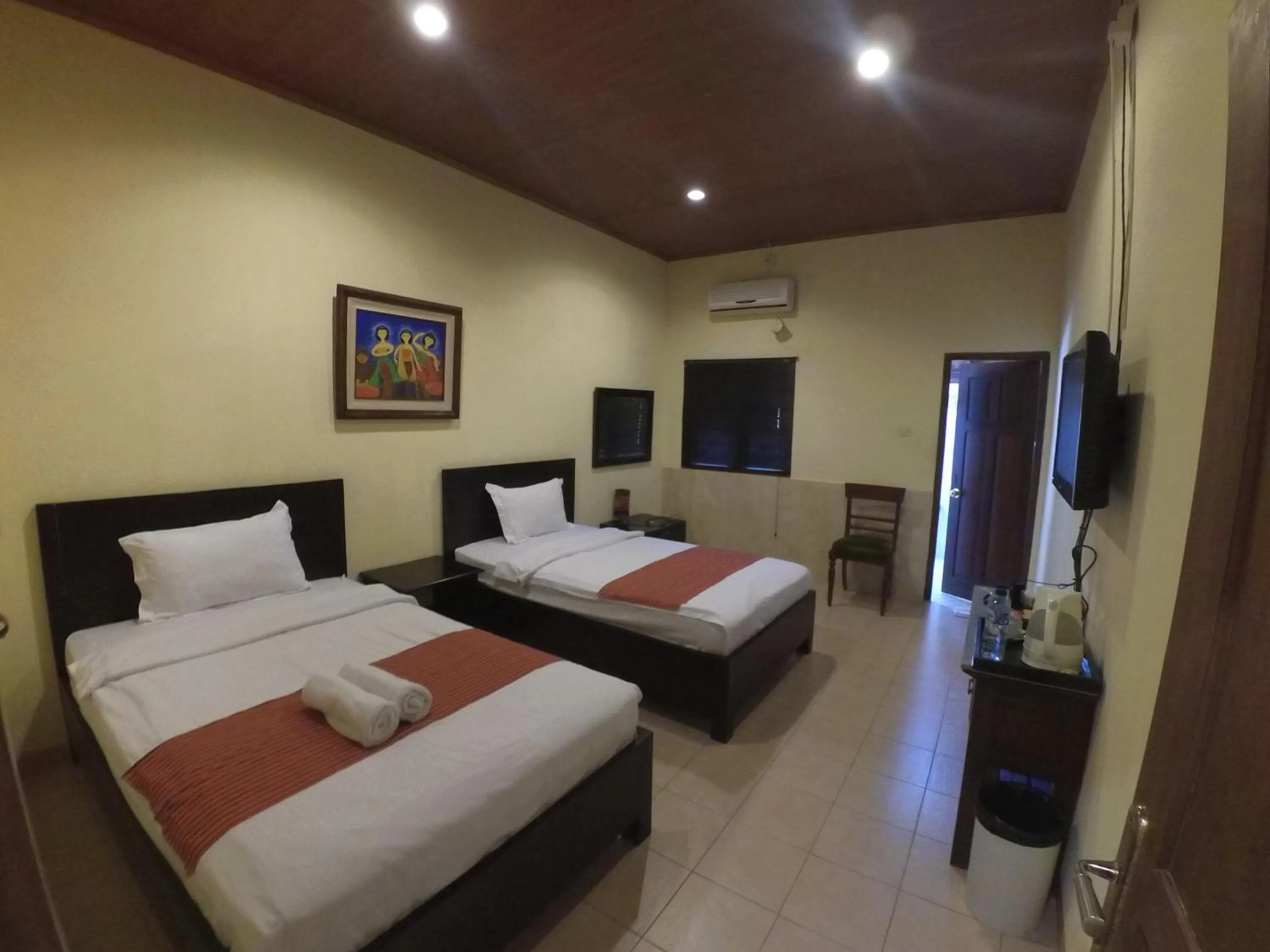 Bed in Alam Jogja Resort Mitra RedDoorz