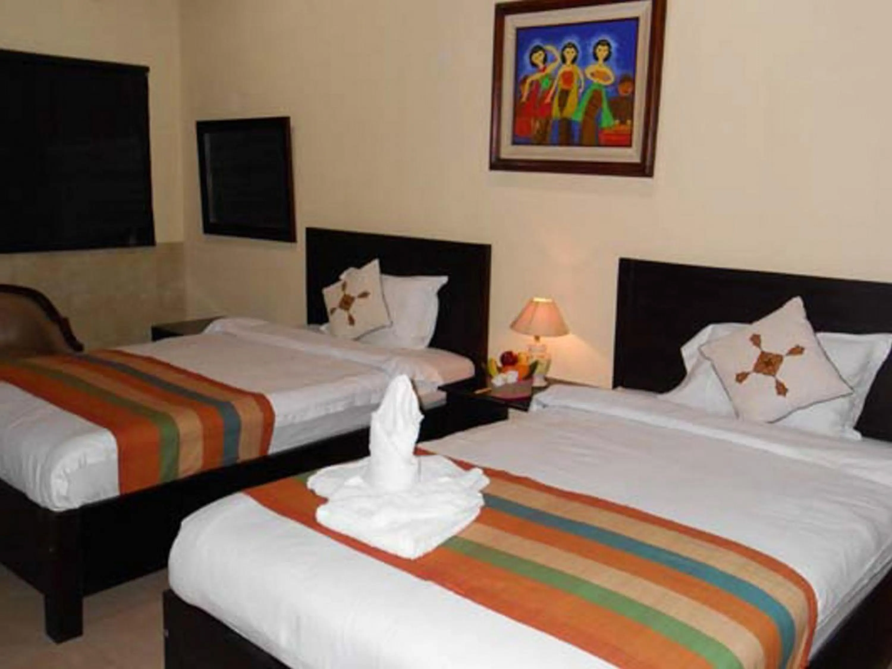 Bed in Alam Jogja Resort Mitra RedDoorz