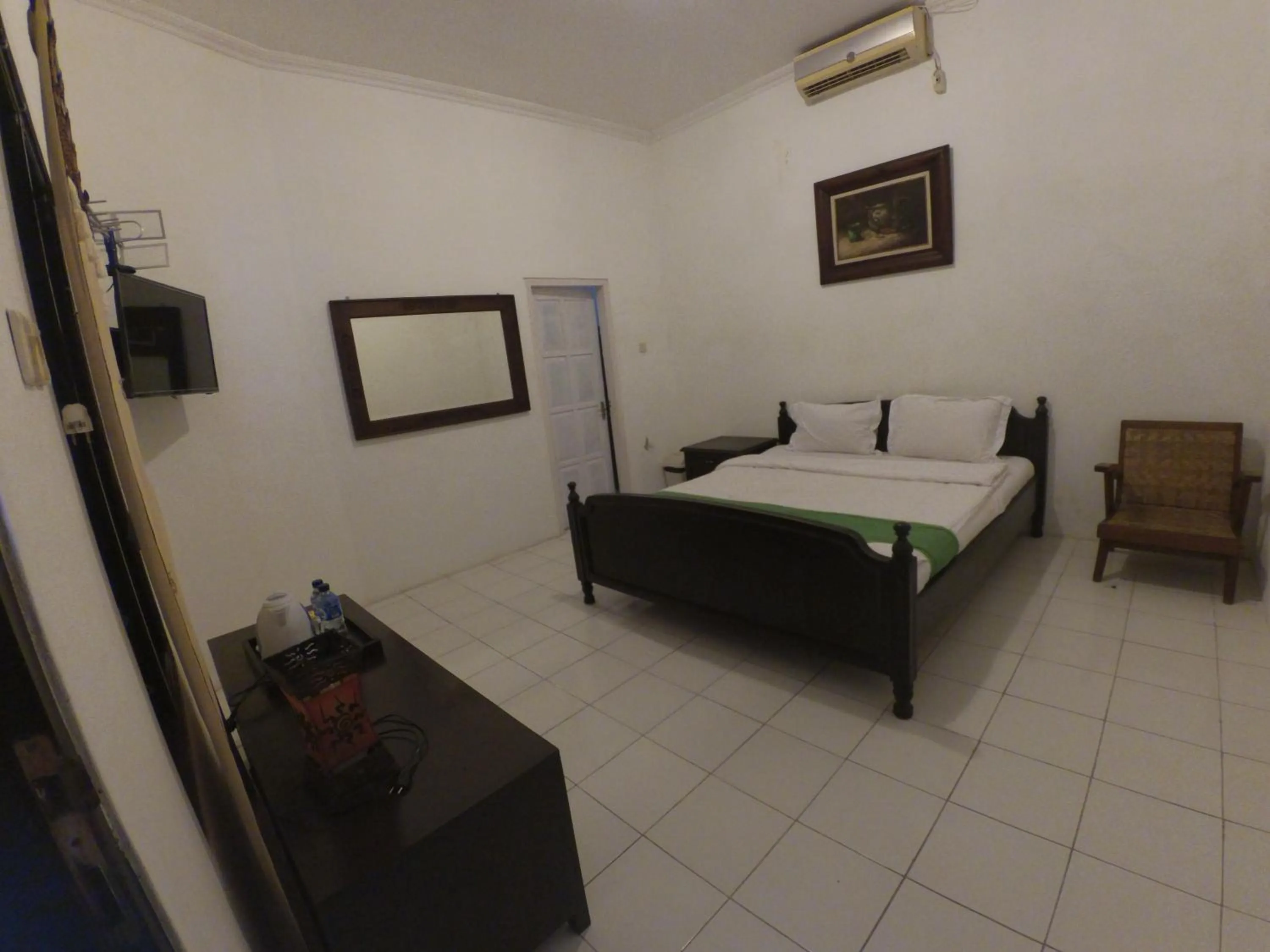 Bed in Alam Jogja Resort Mitra RedDoorz