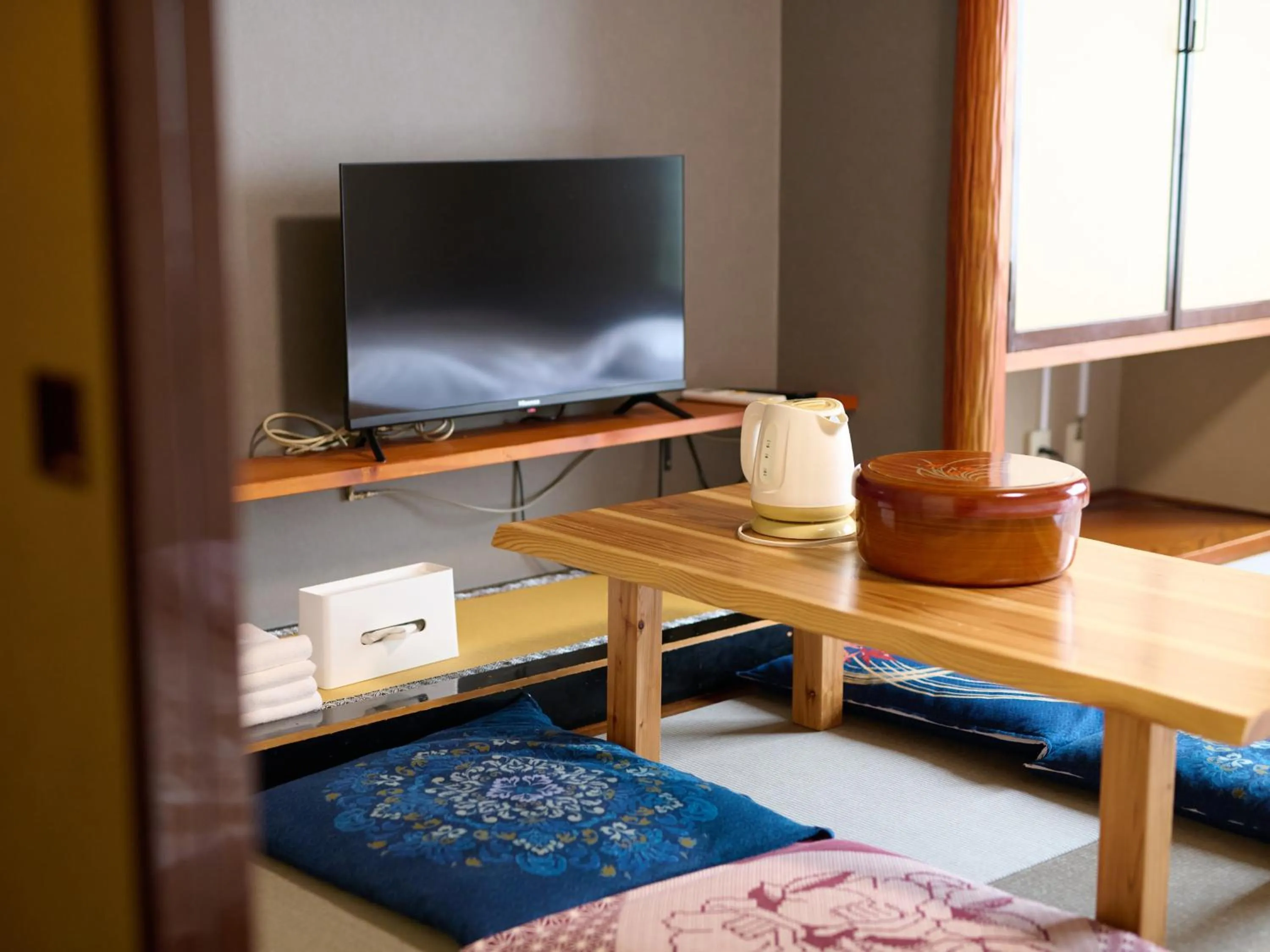 Communal lounge/ TV room in Tabist Hotel Seishokan