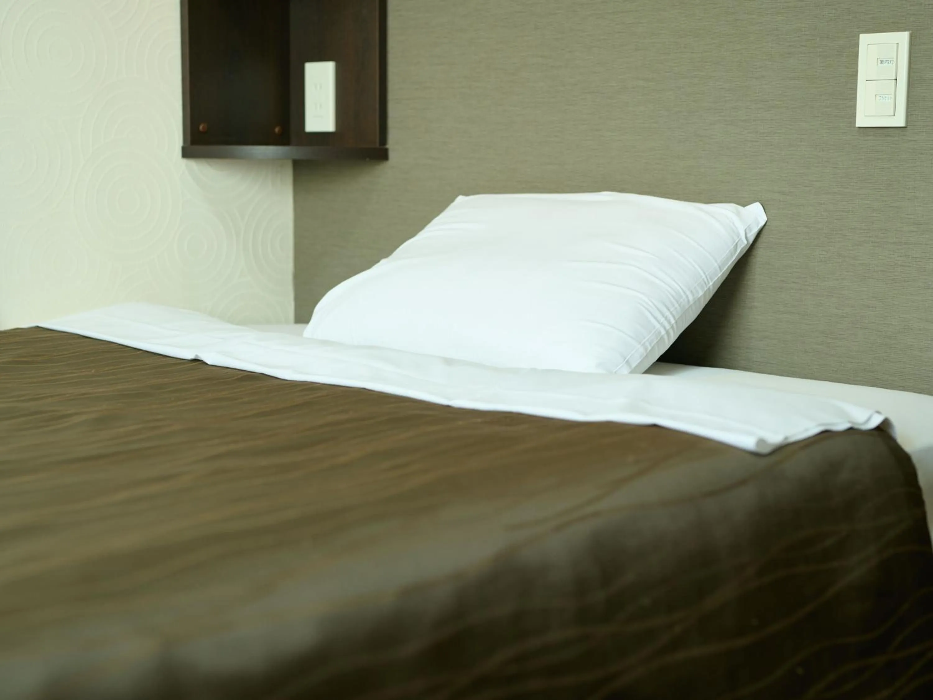 Bed in Tabist Hotel Seishokan