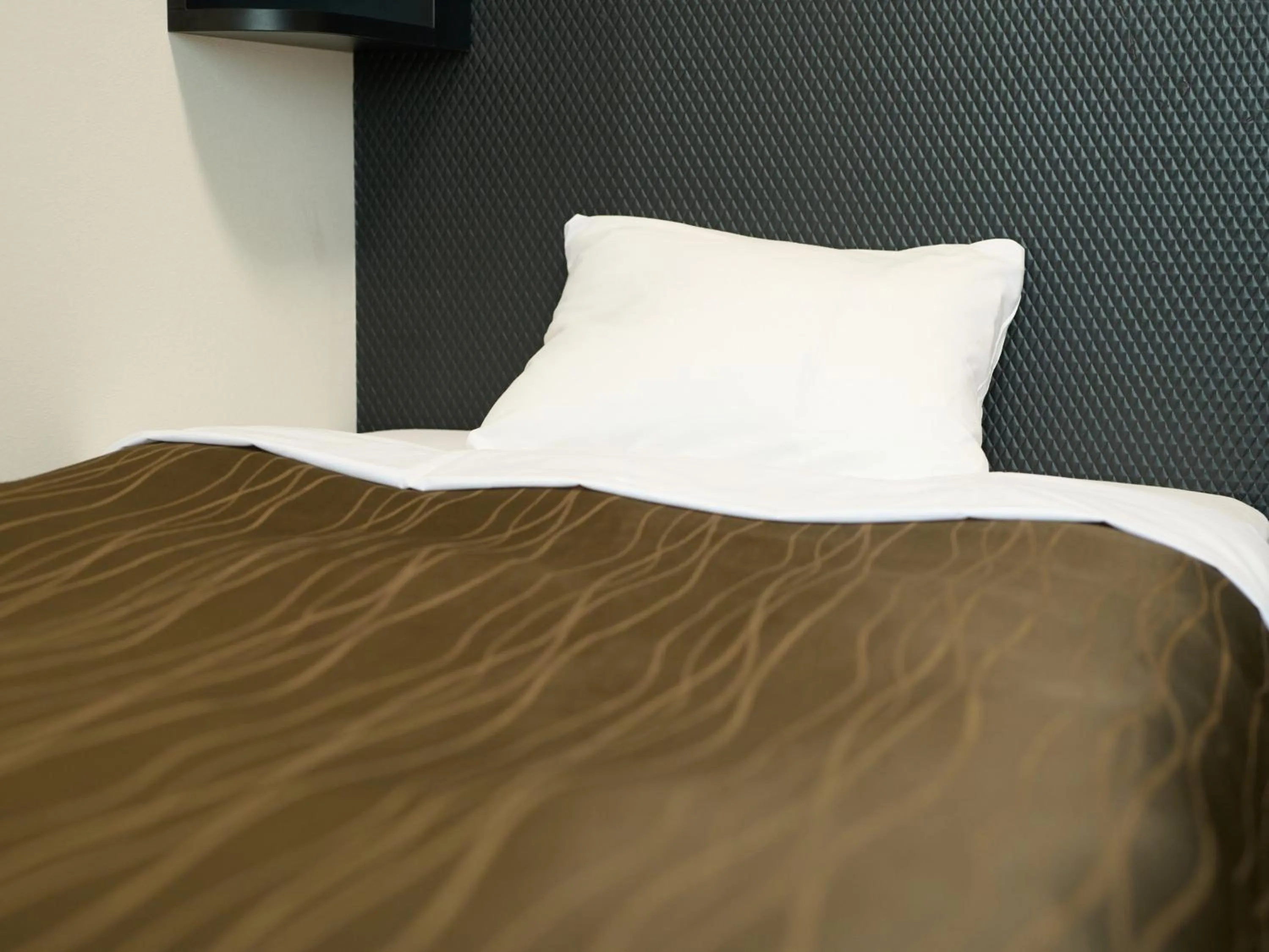 Bed in Tabist Hotel Seishokan