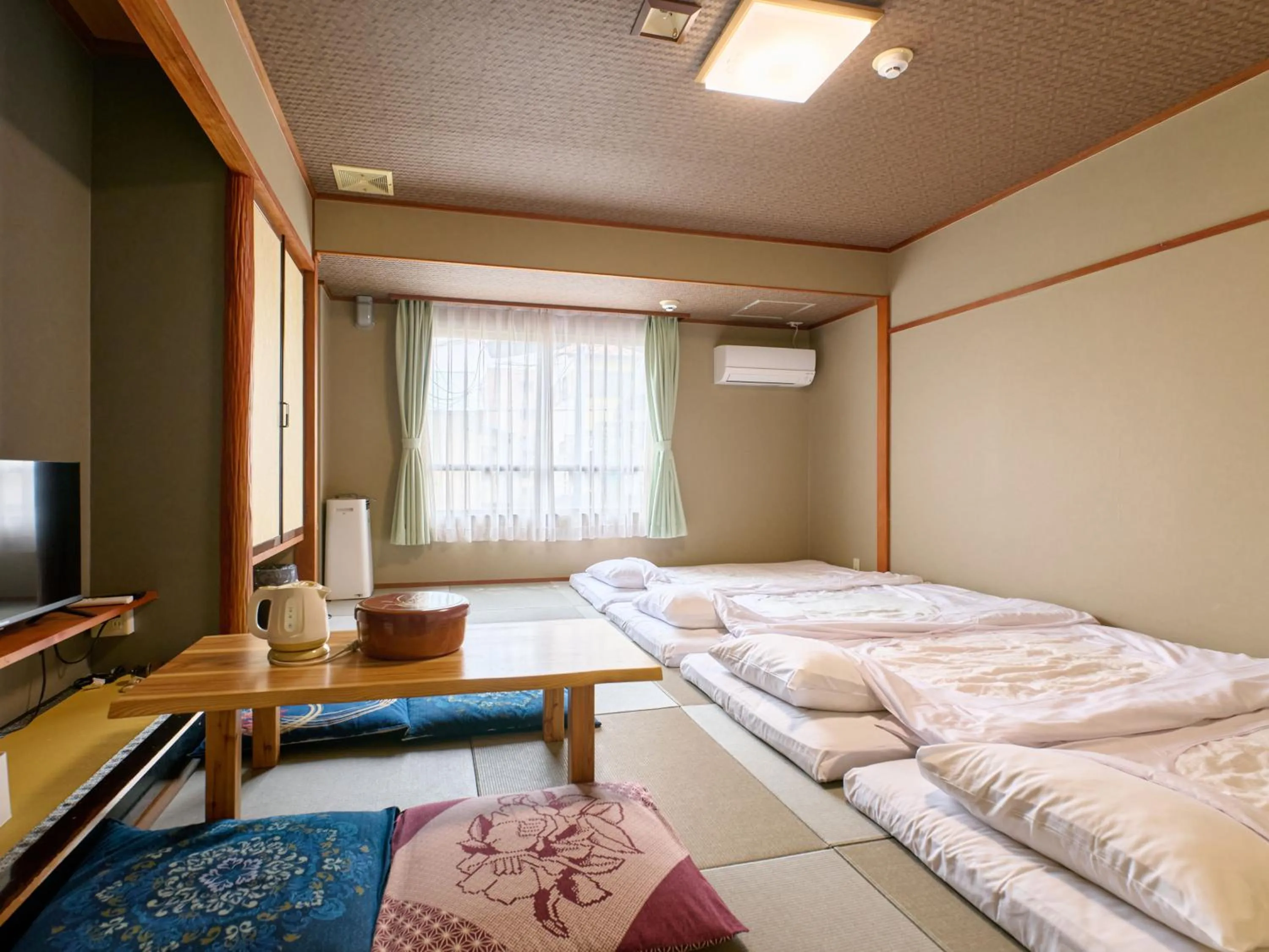 Photo of the whole room, Bed in Tabist Hotel Seishokan