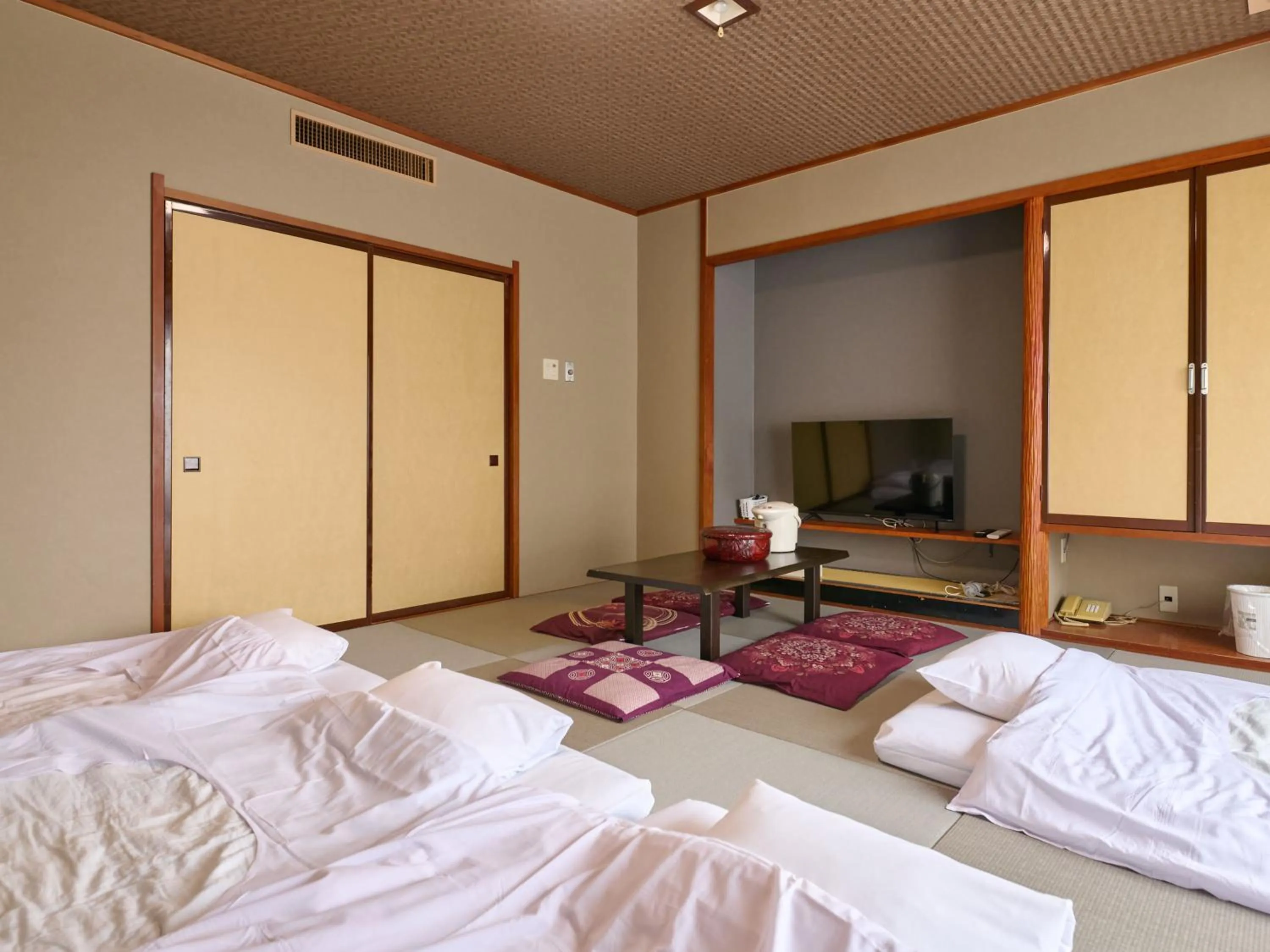 Photo of the whole room, Bed in Tabist Hotel Seishokan