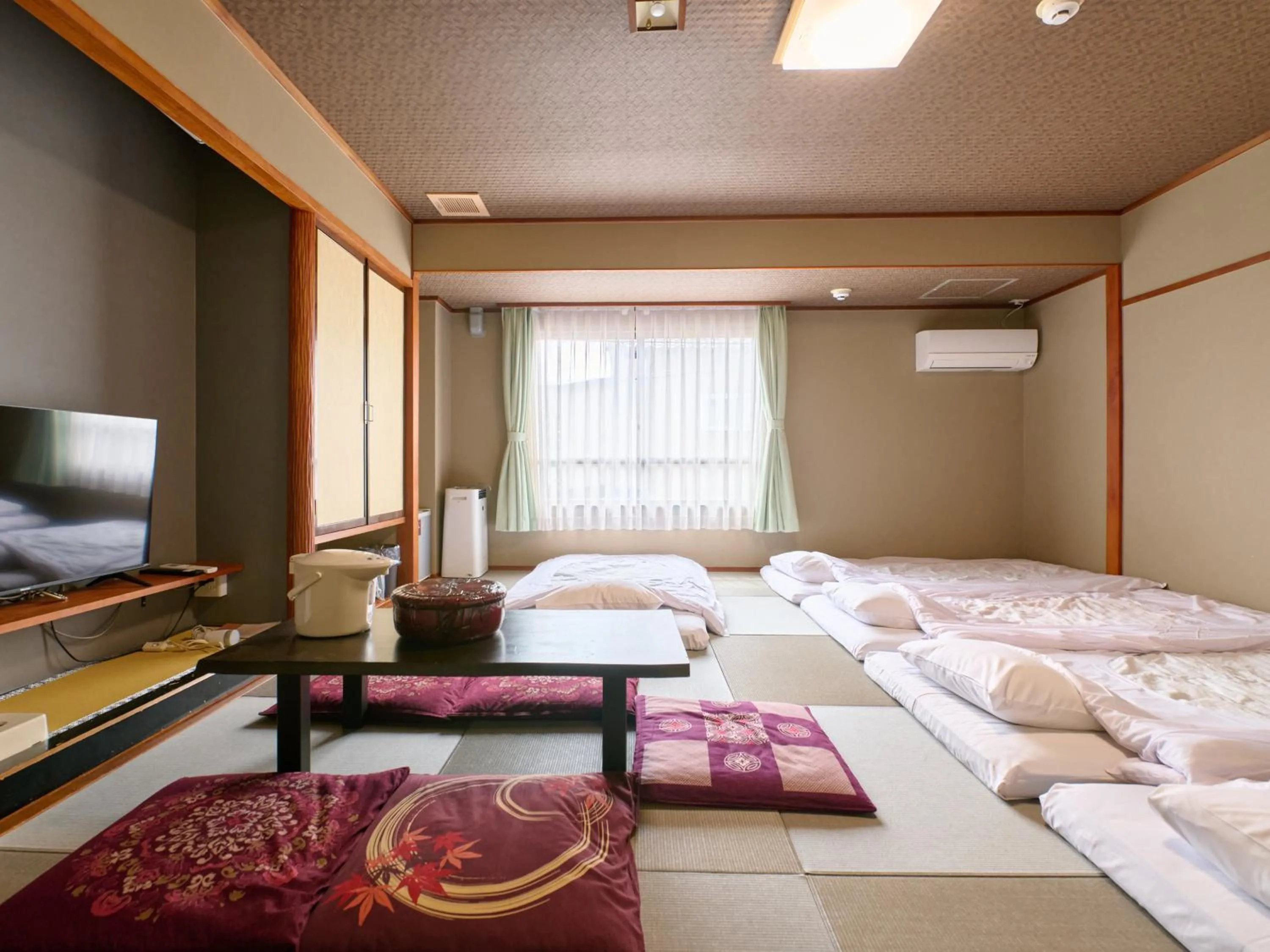 Photo of the whole room, Bed in Tabist Hotel Seishokan