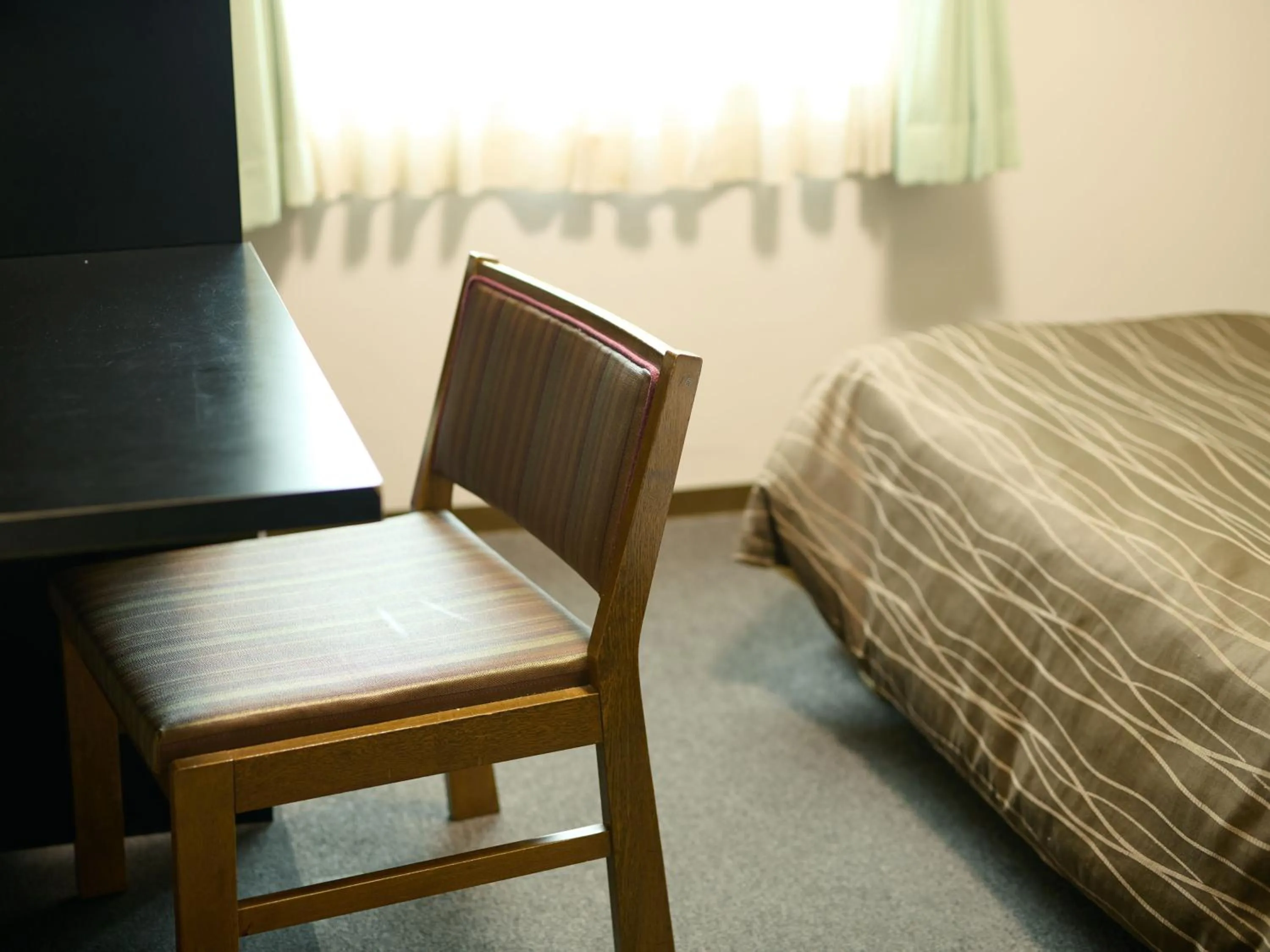 Bed in Tabist Hotel Seishokan