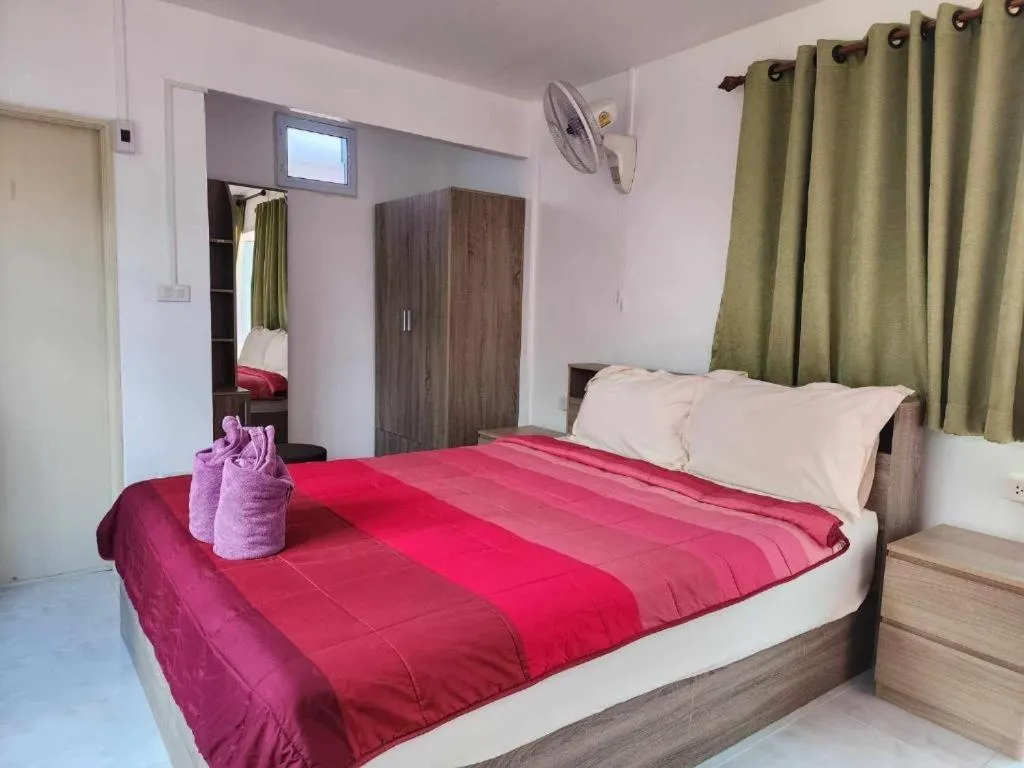 Bed in Baan Sabaijai Resort