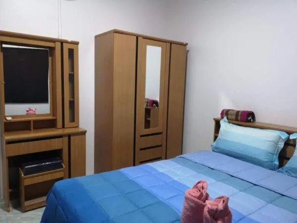 Bed in Baan Sabaijai Resort