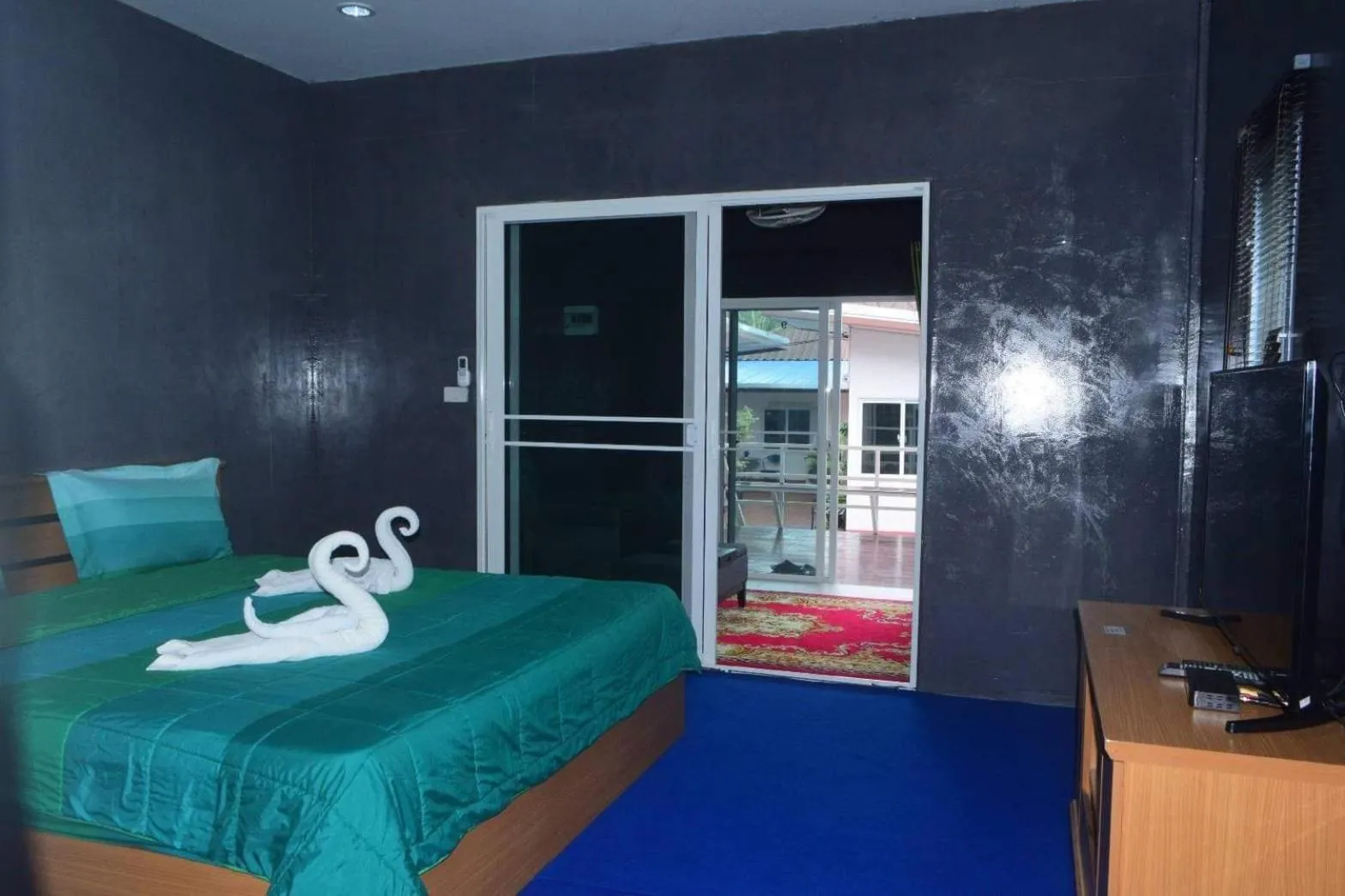 Bed in Baan Sabaijai Resort