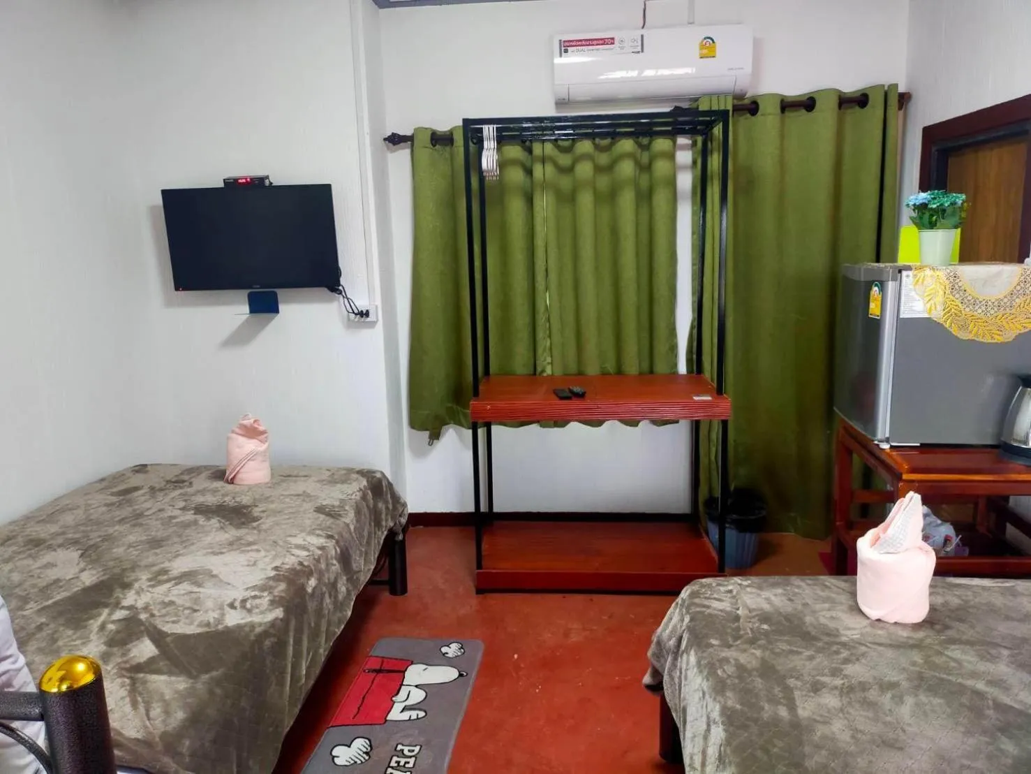 Bed in Baan Sabaijai Resort