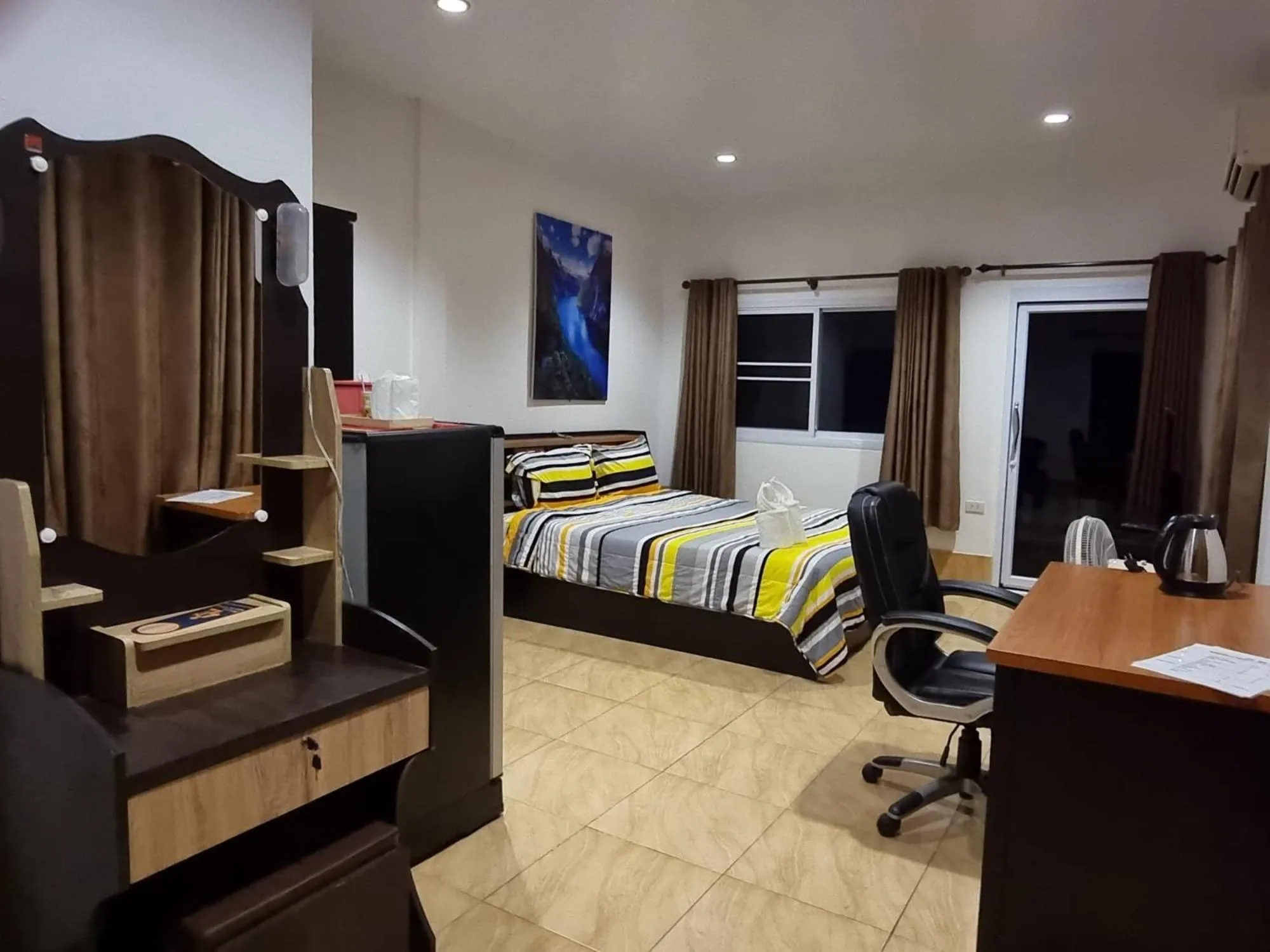 Bed in Baan Sabaijai Resort