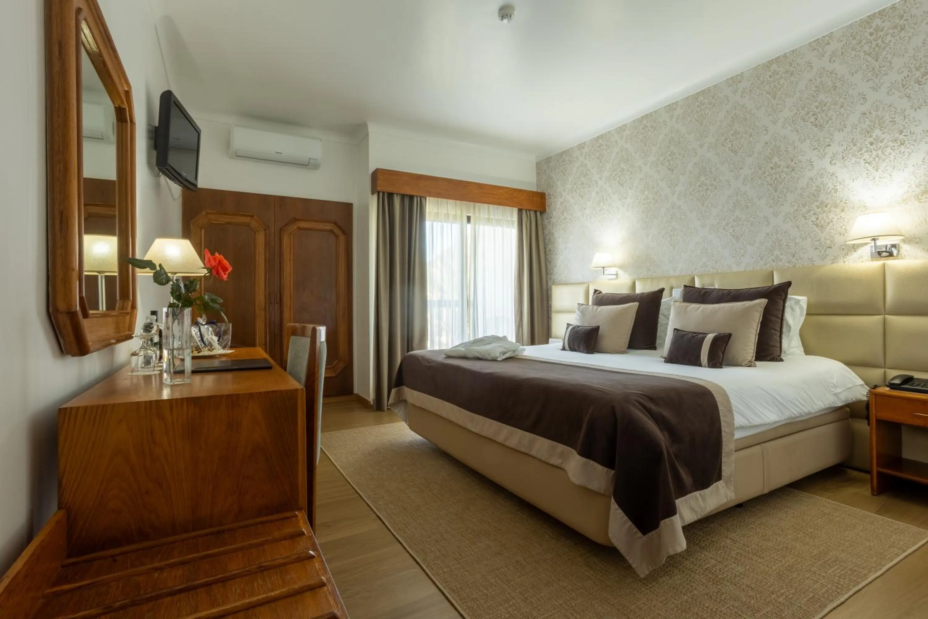 Bed in Hotel Sao Jorge Garden