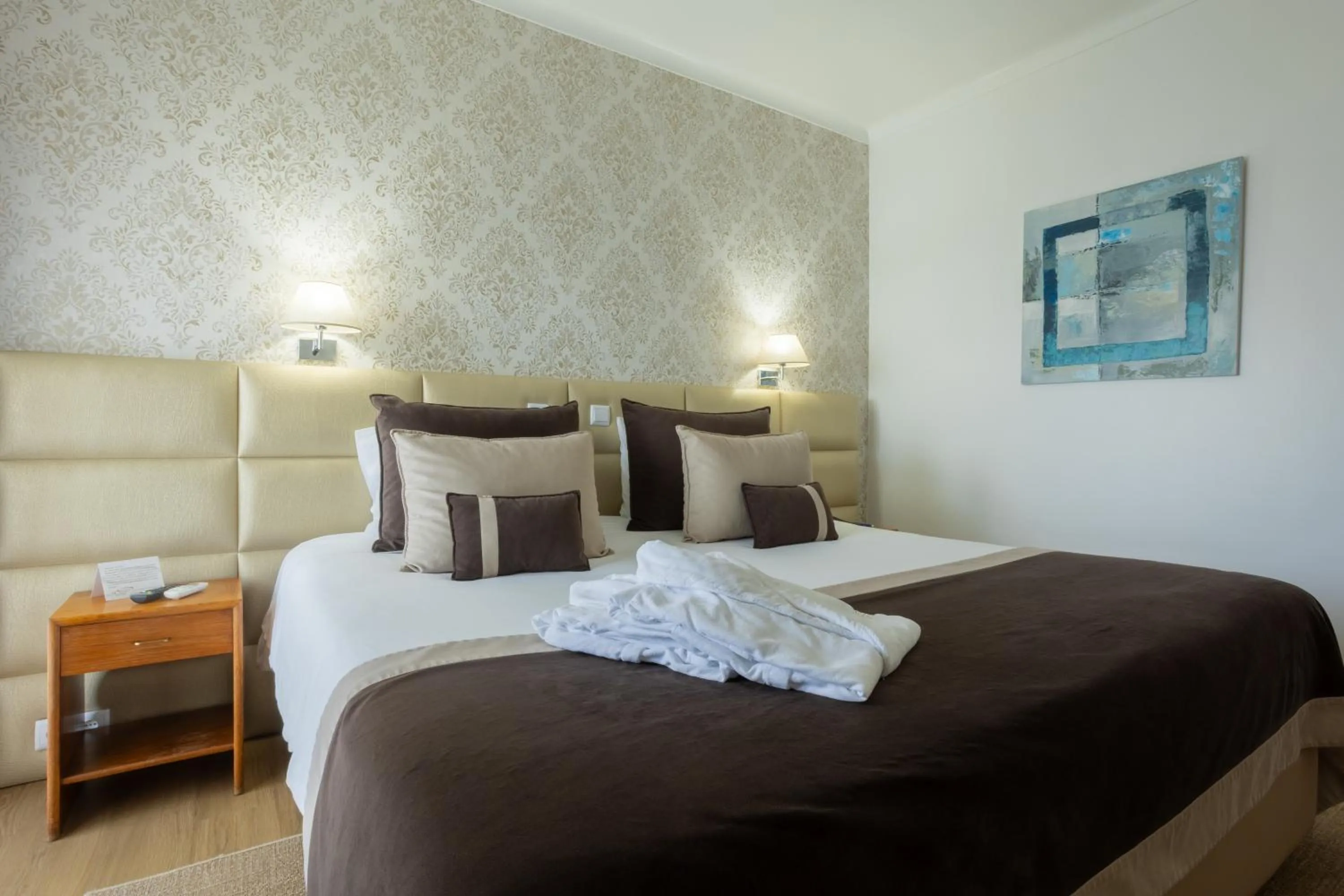 Bed in Hotel Sao Jorge Garden