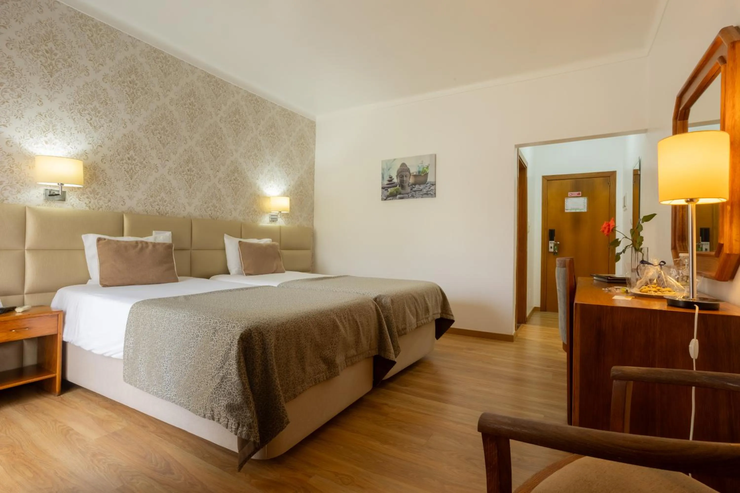 Bed in Hotel Sao Jorge Garden