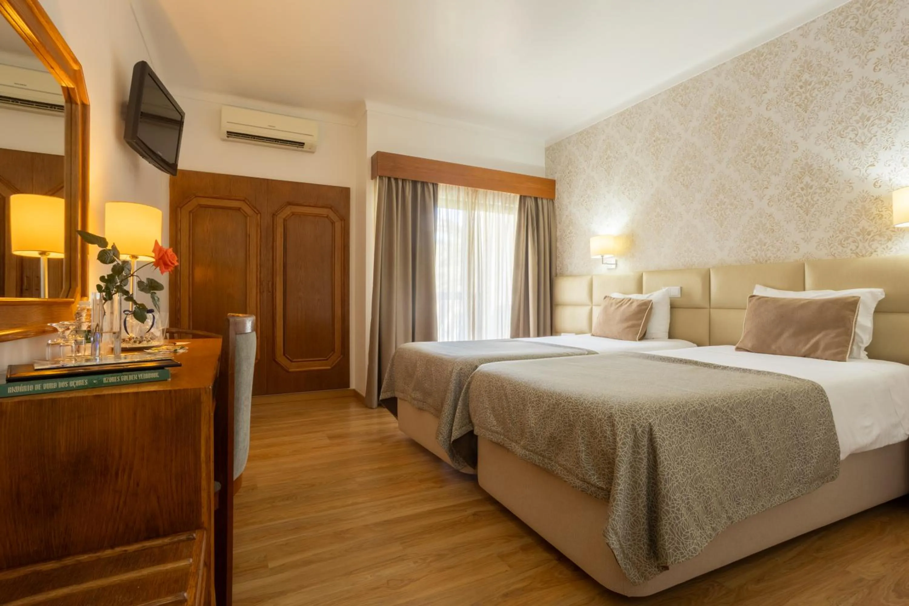 Bed in Hotel Sao Jorge Garden