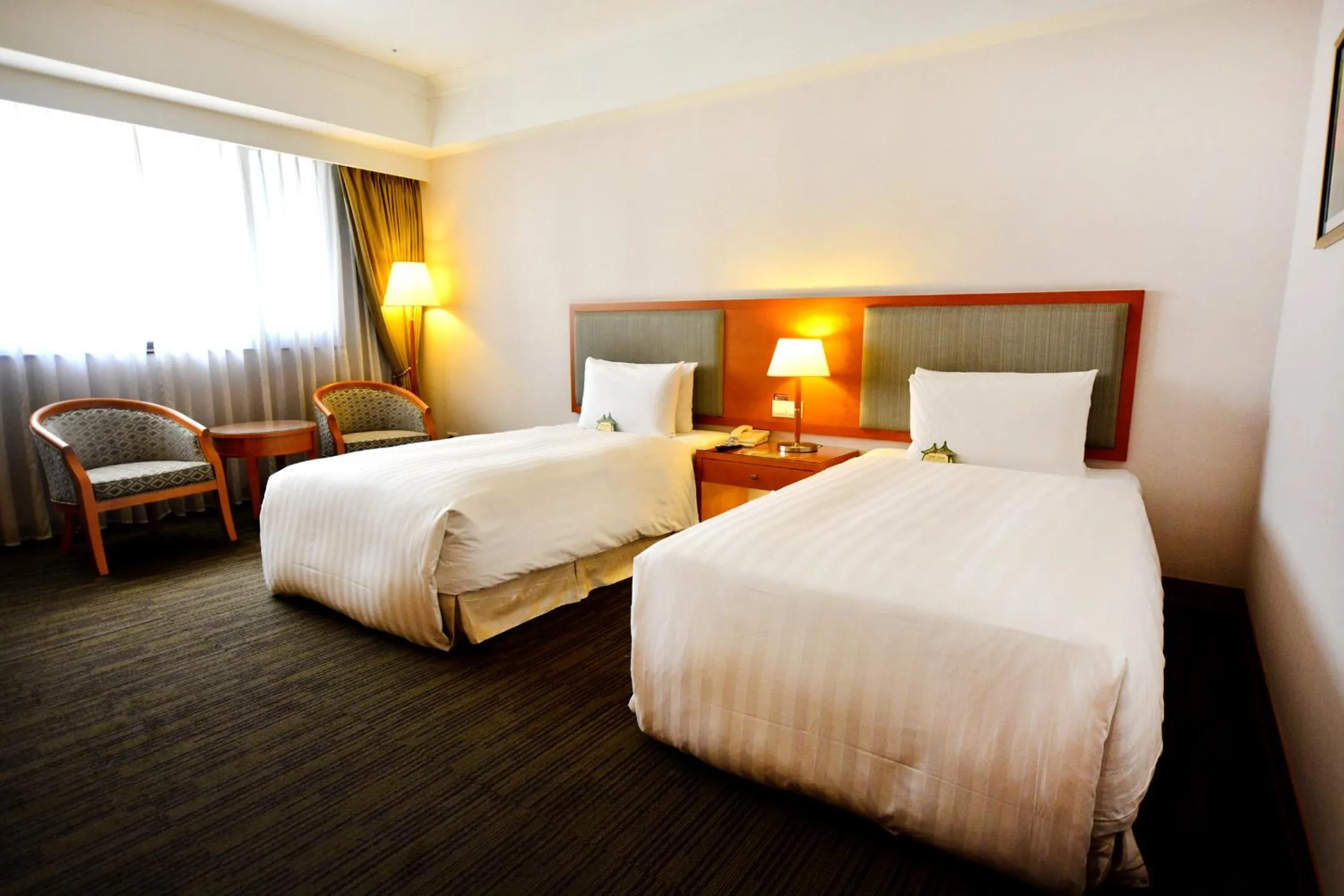 Bed in Fushin Hotel Taichung
