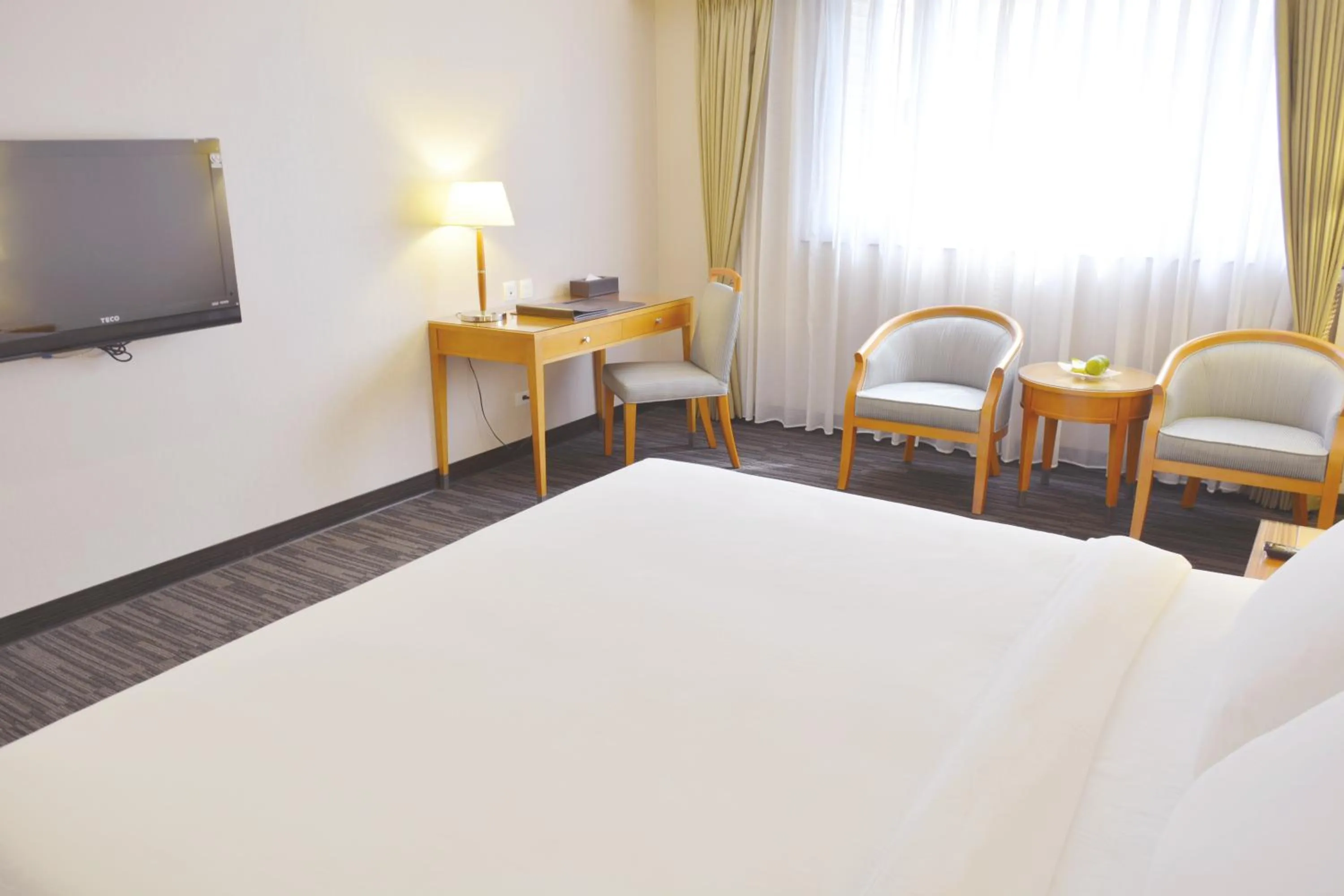 Bed in Fushin Hotel Taichung