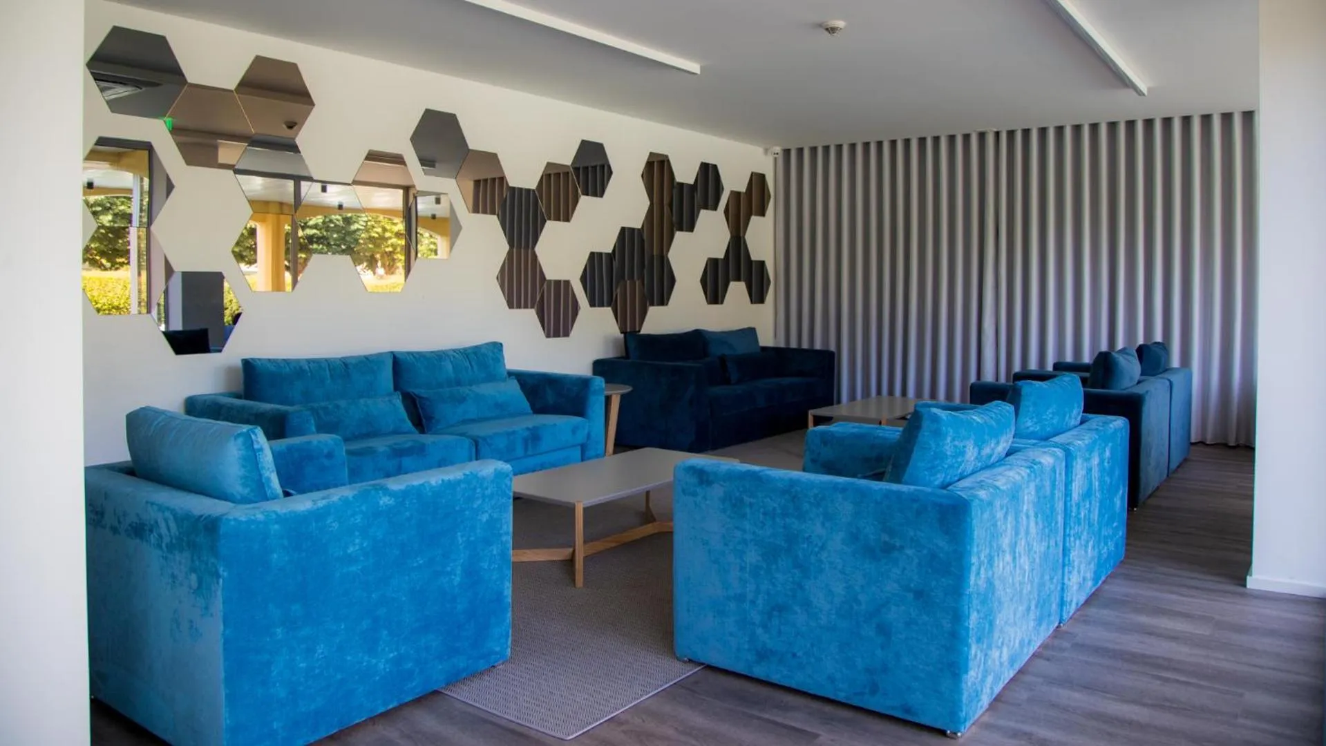 Communal lounge/ TV room in Hotel do Parque