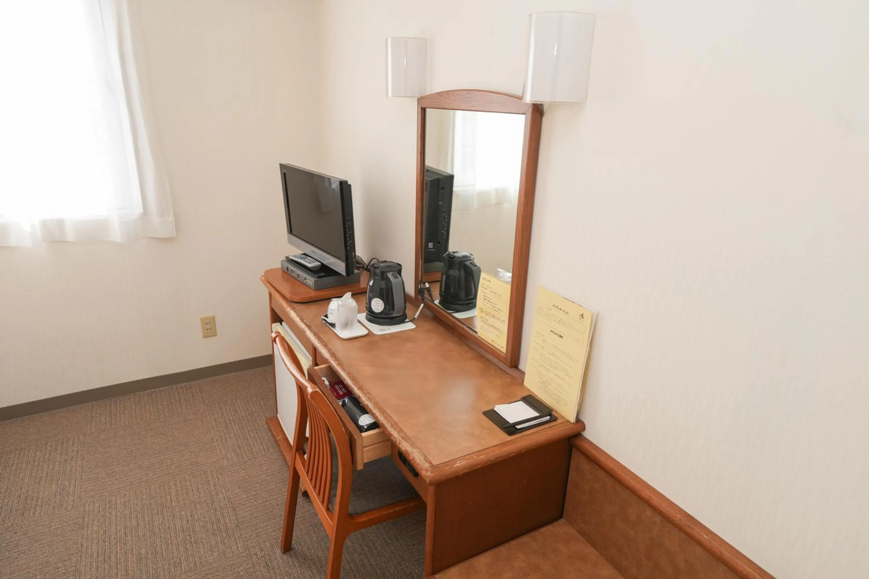 Photo of the whole room in Tendo Central Hotel