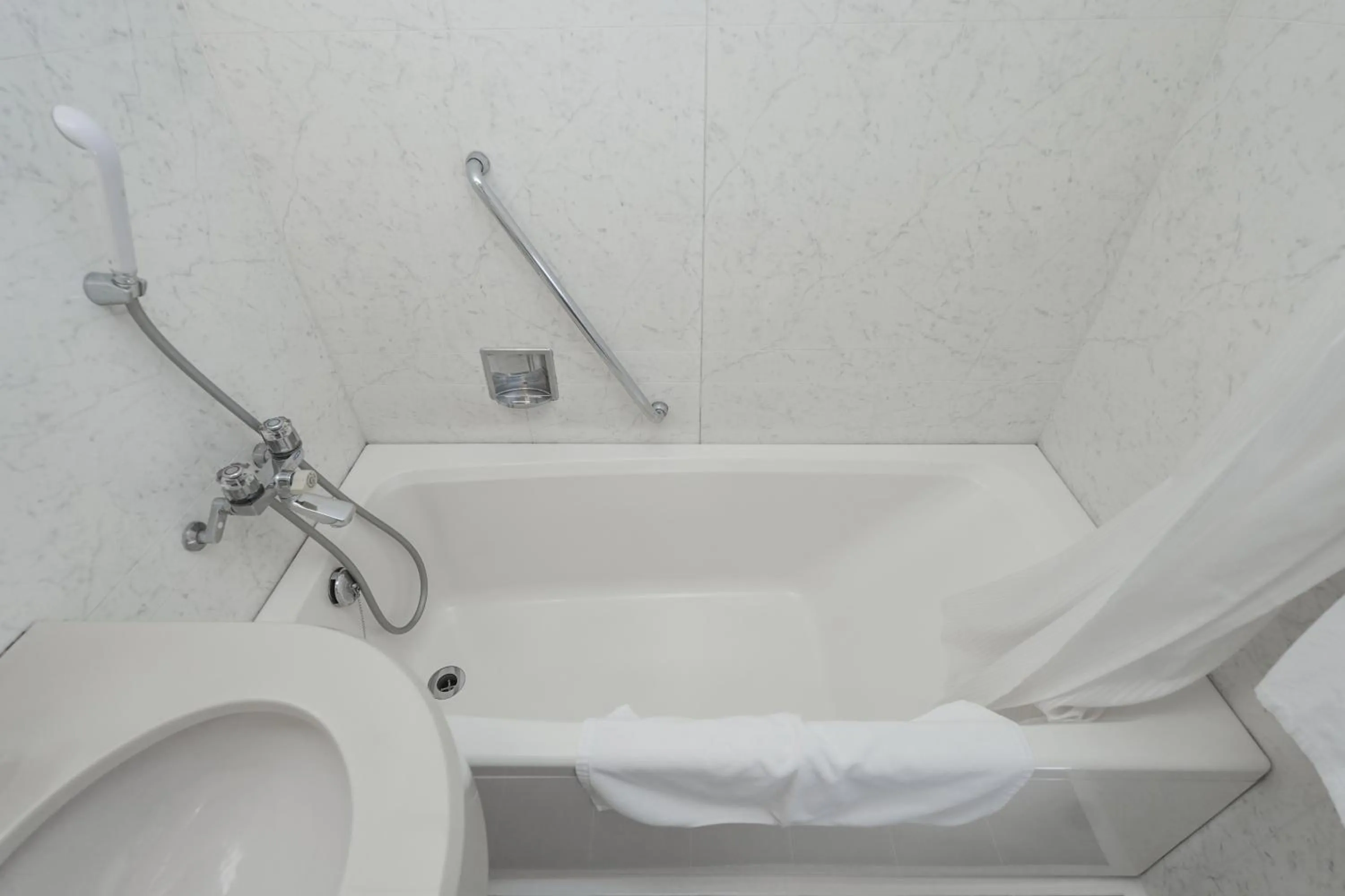 Bathroom in Tendo Central Hotel