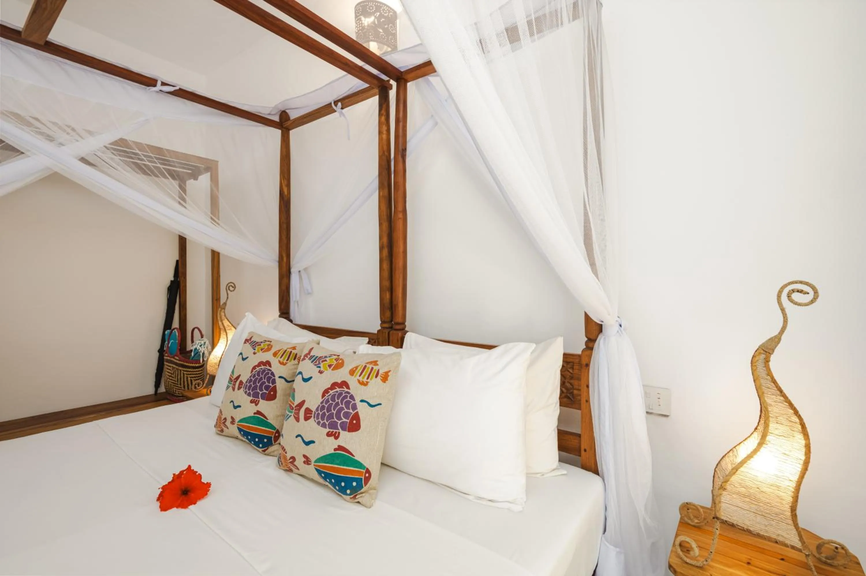 Bed in Mvuvi Boutique Resort