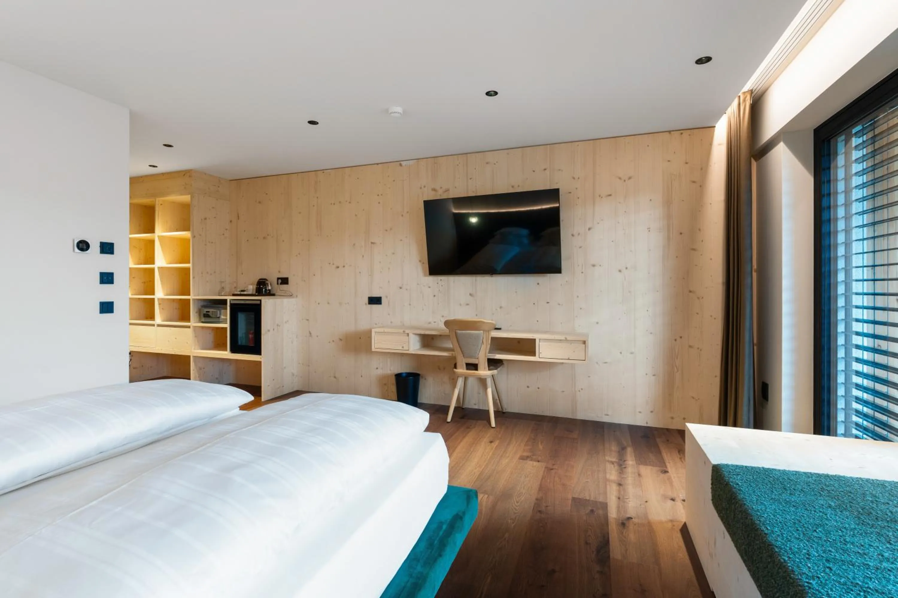 Photo of the whole room, Bed in Dolomites Nature Hotel Vigilerhof