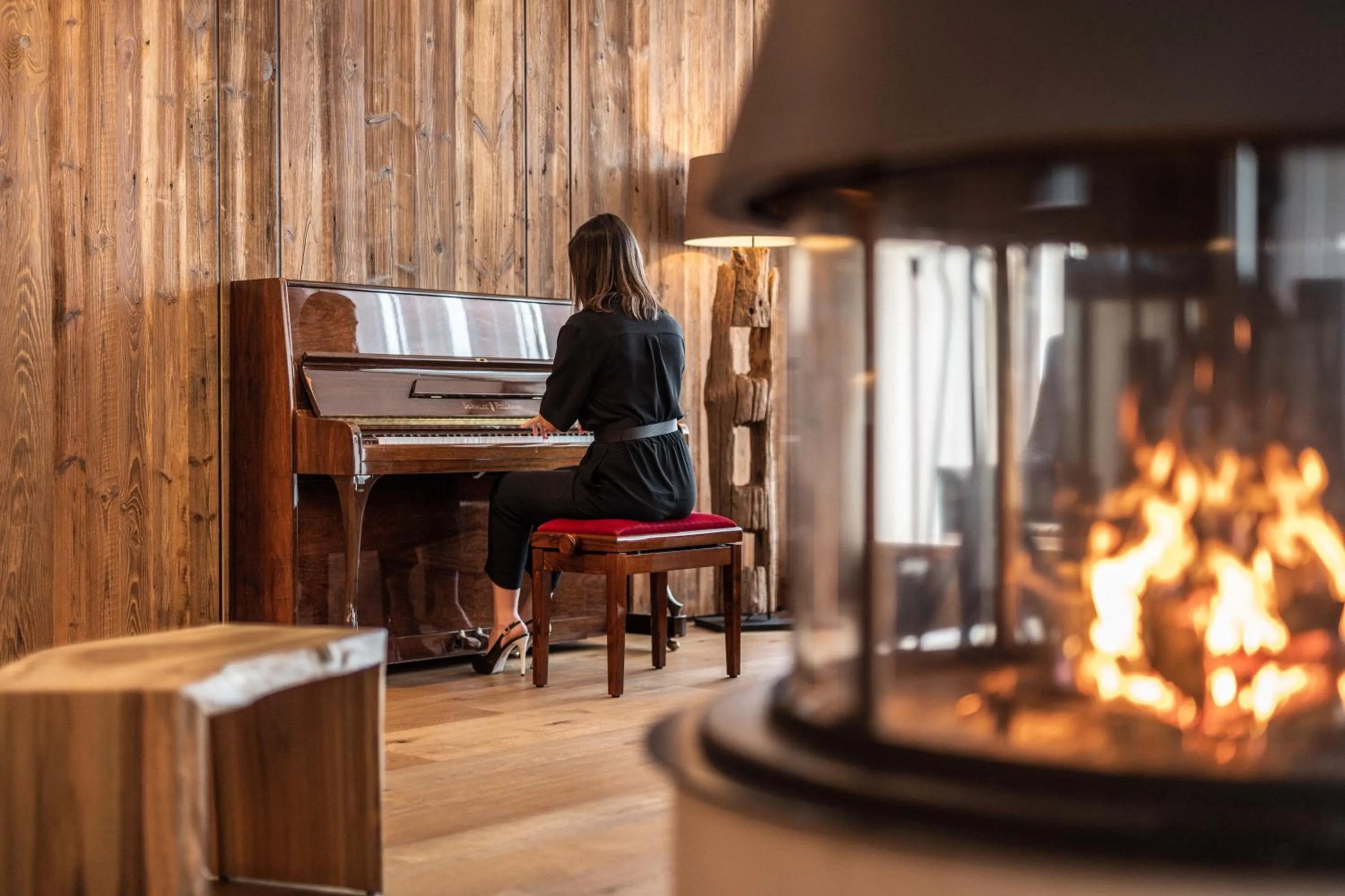 Communal lounge/ TV room in Dolomites Nature Hotel Vigilerhof