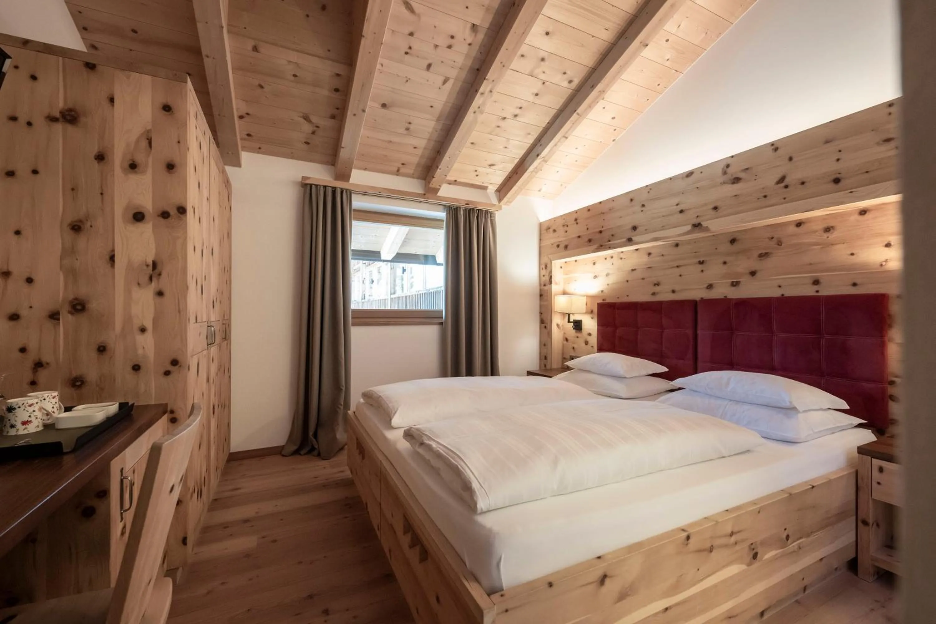 Photo of the whole room, Bed in Dolomites Nature Hotel Vigilerhof