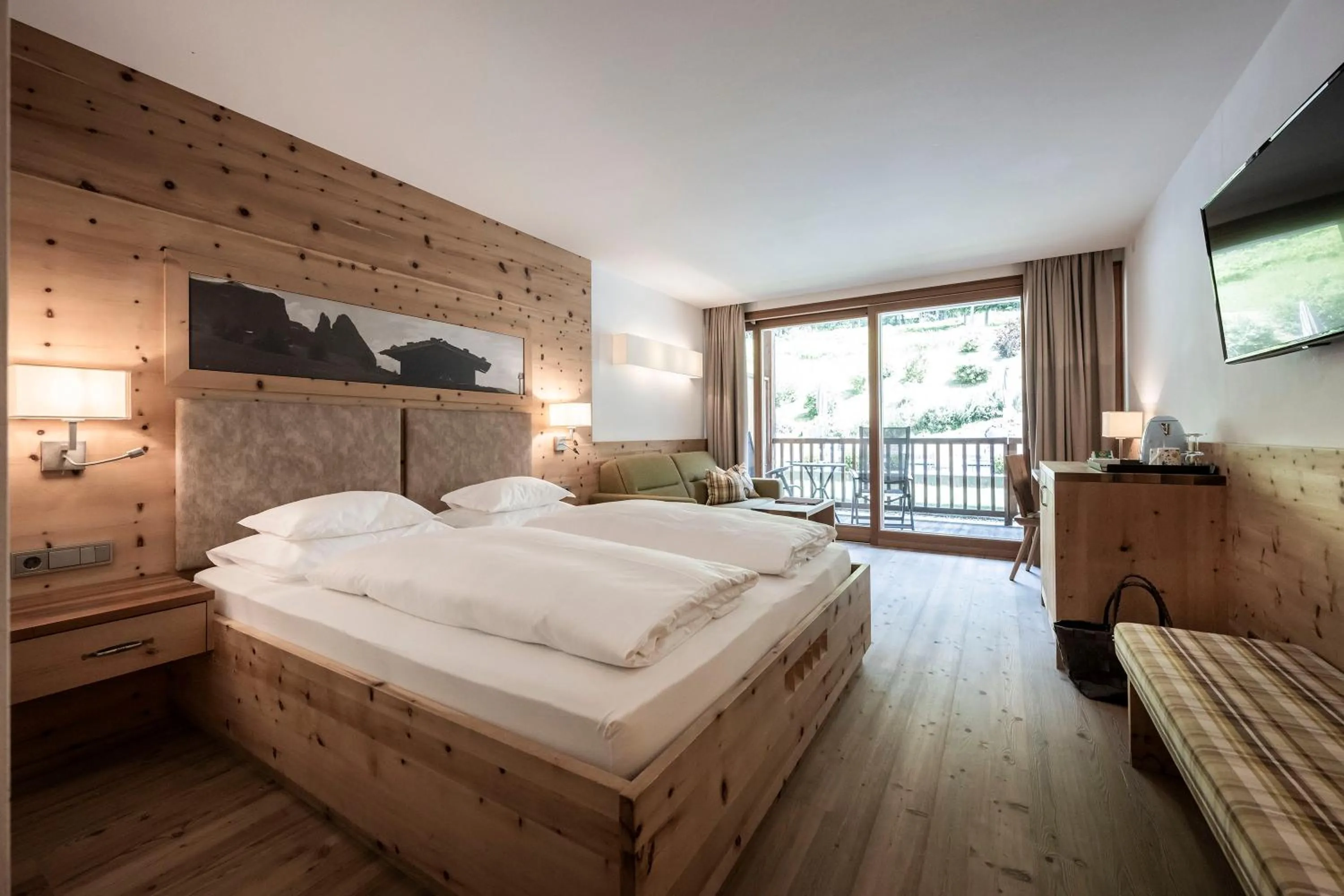 Photo of the whole room, Bed in Dolomites Nature Hotel Vigilerhof