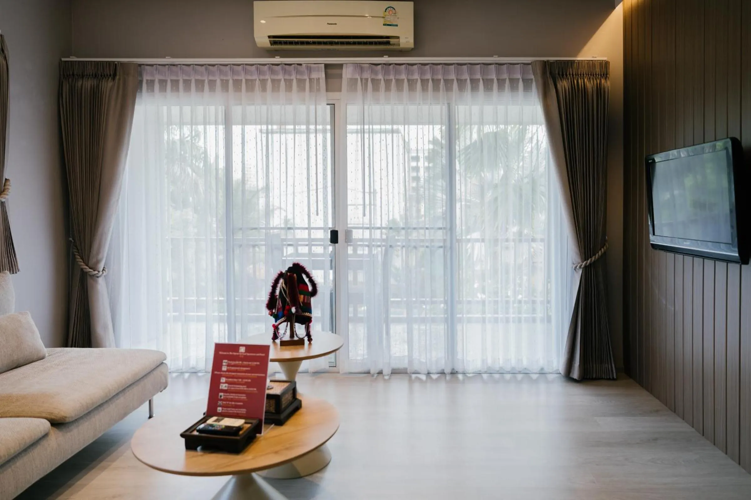 Living room in The Opium Chiang Mai