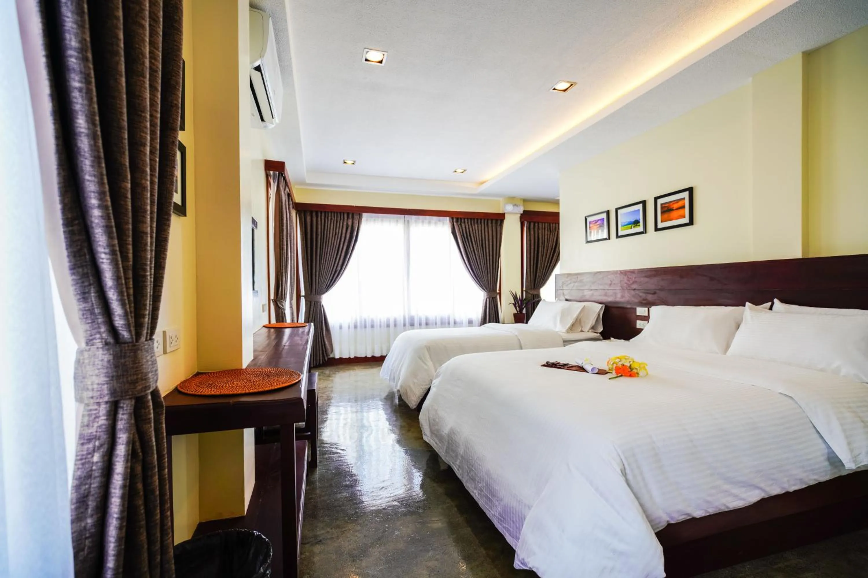 Photo of the whole room, Bed in Retreat Siargao Resort