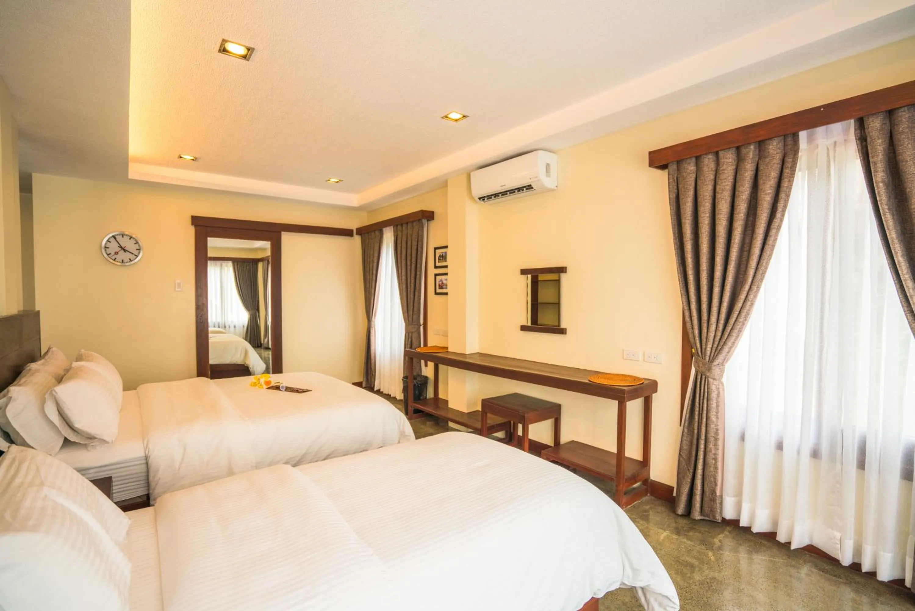 Photo of the whole room, Bed in Retreat Siargao Resort