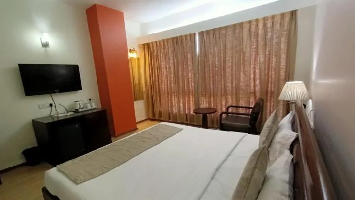 Bed in Inventree hotels & Resort