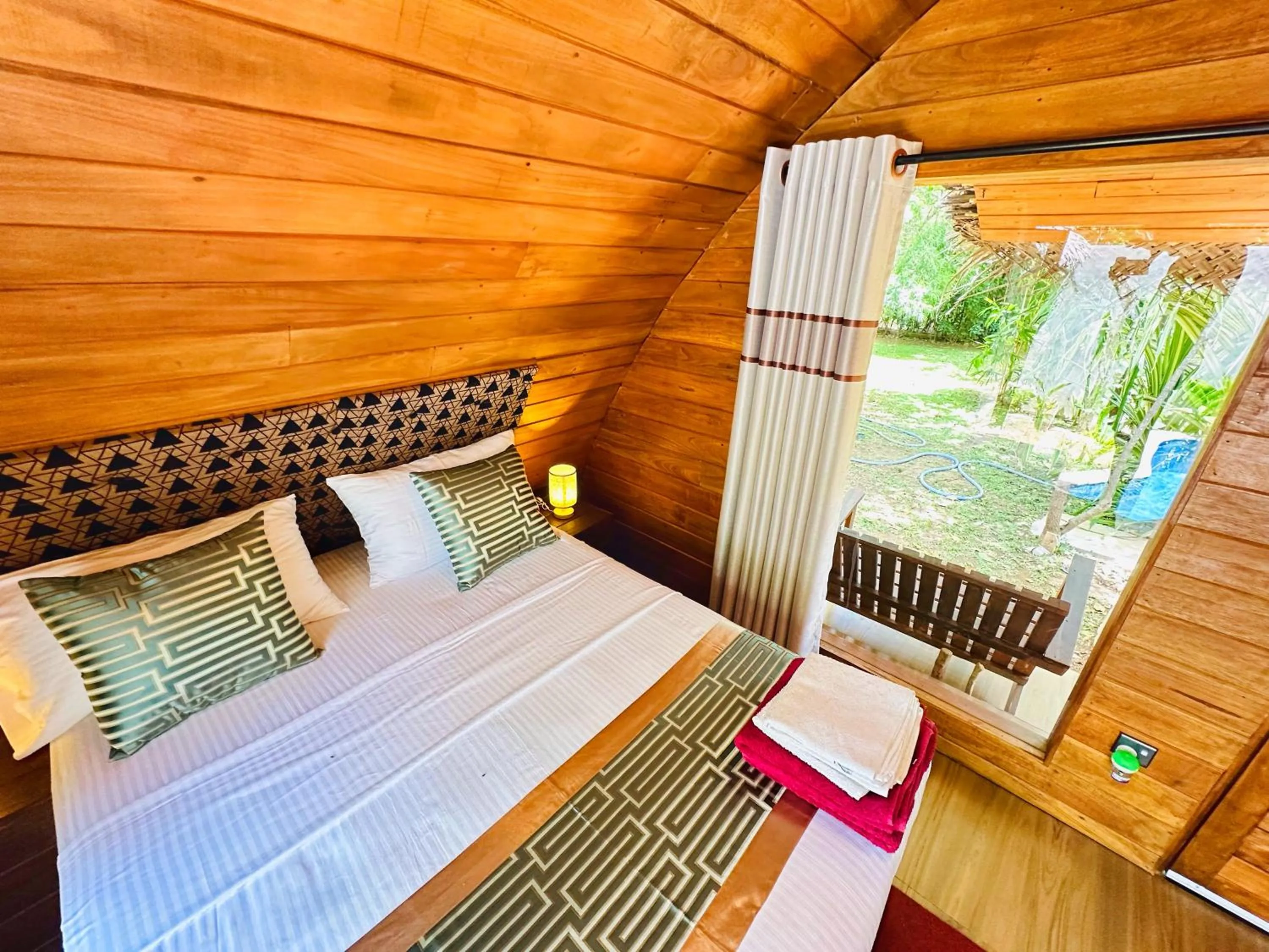 Bed in Palmyra Nature Resort Sigiriya
