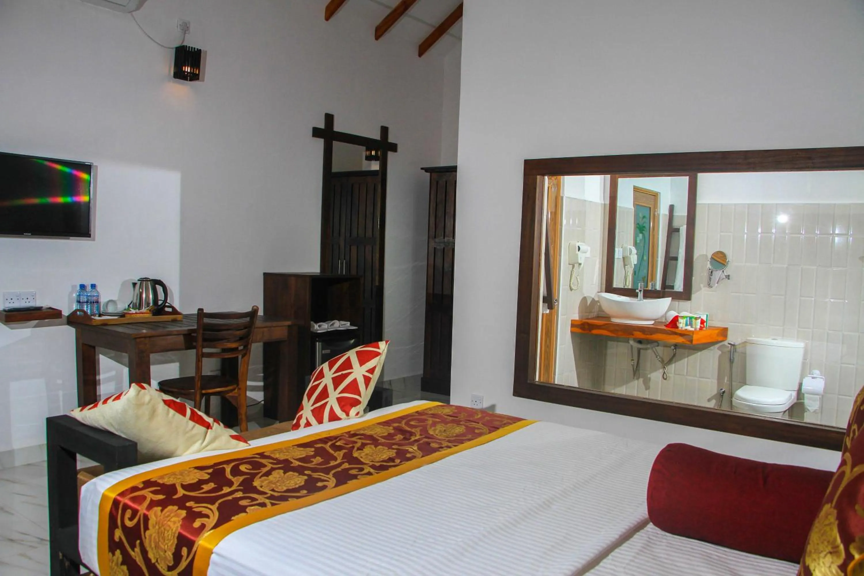 Bed in Palmyra Nature Resort Sigiriya