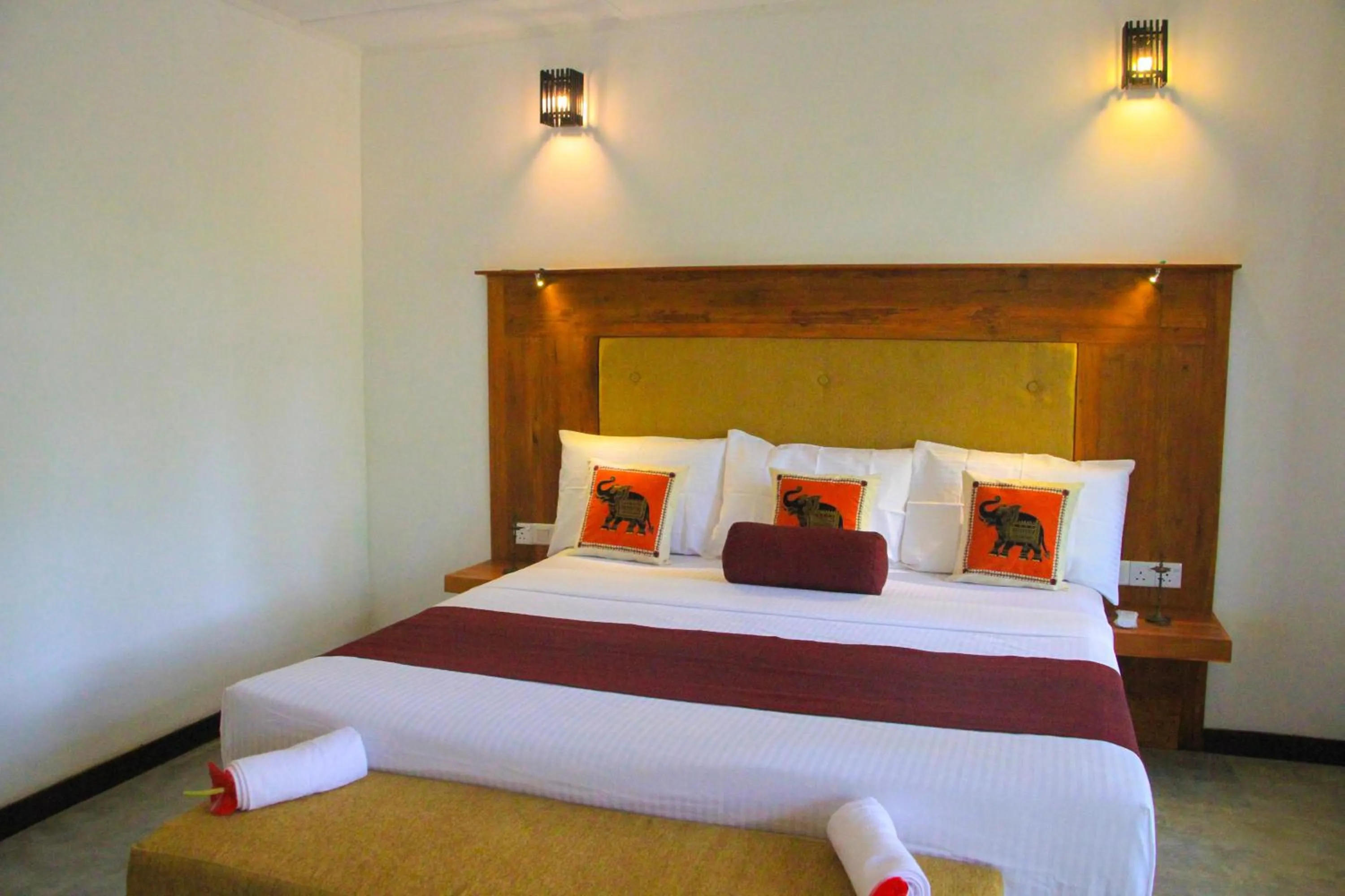 Bed in Palmyra Nature Resort Sigiriya