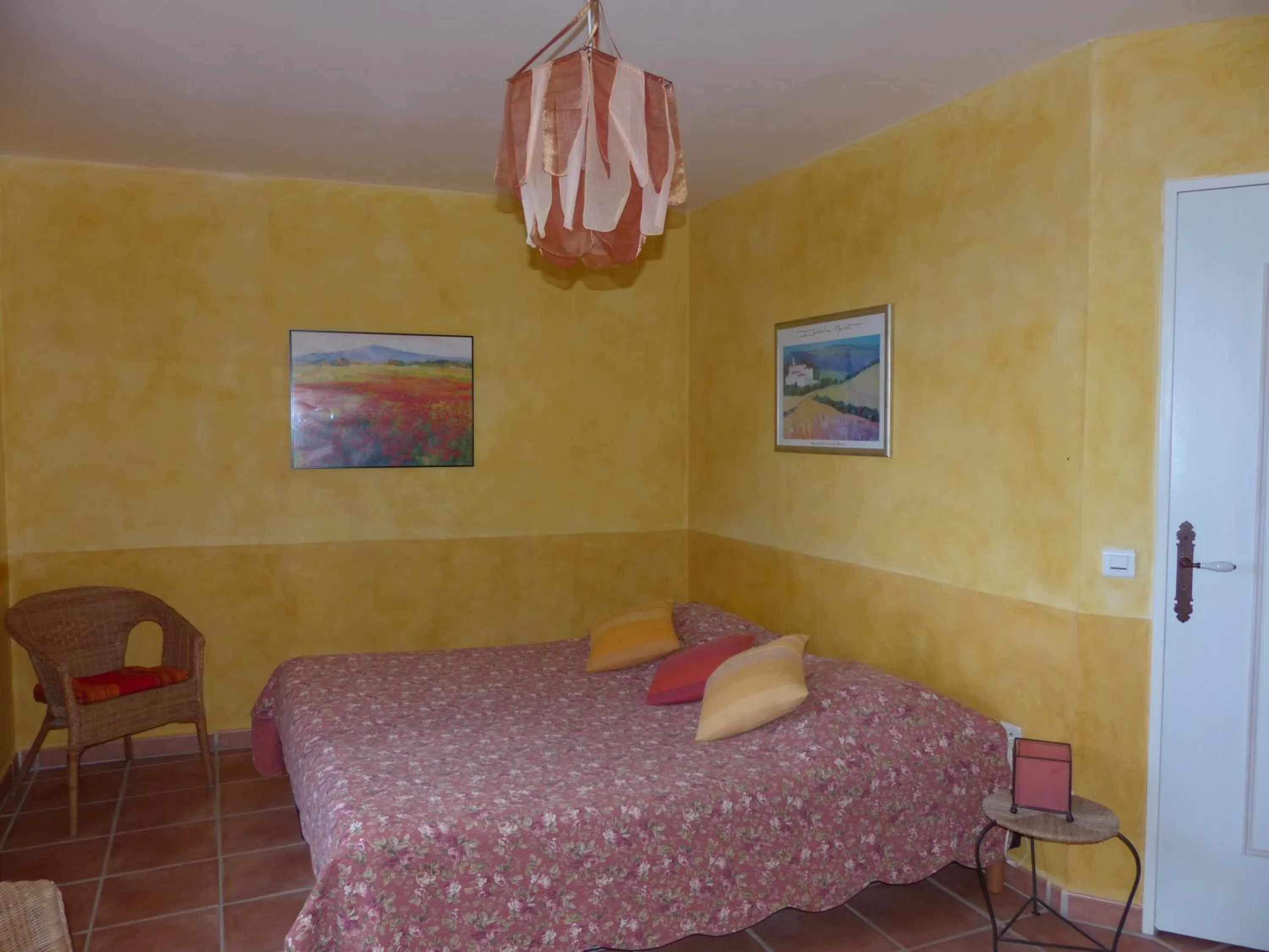 Bed in La Ferme du petit Ségriès Bed and Breakfast