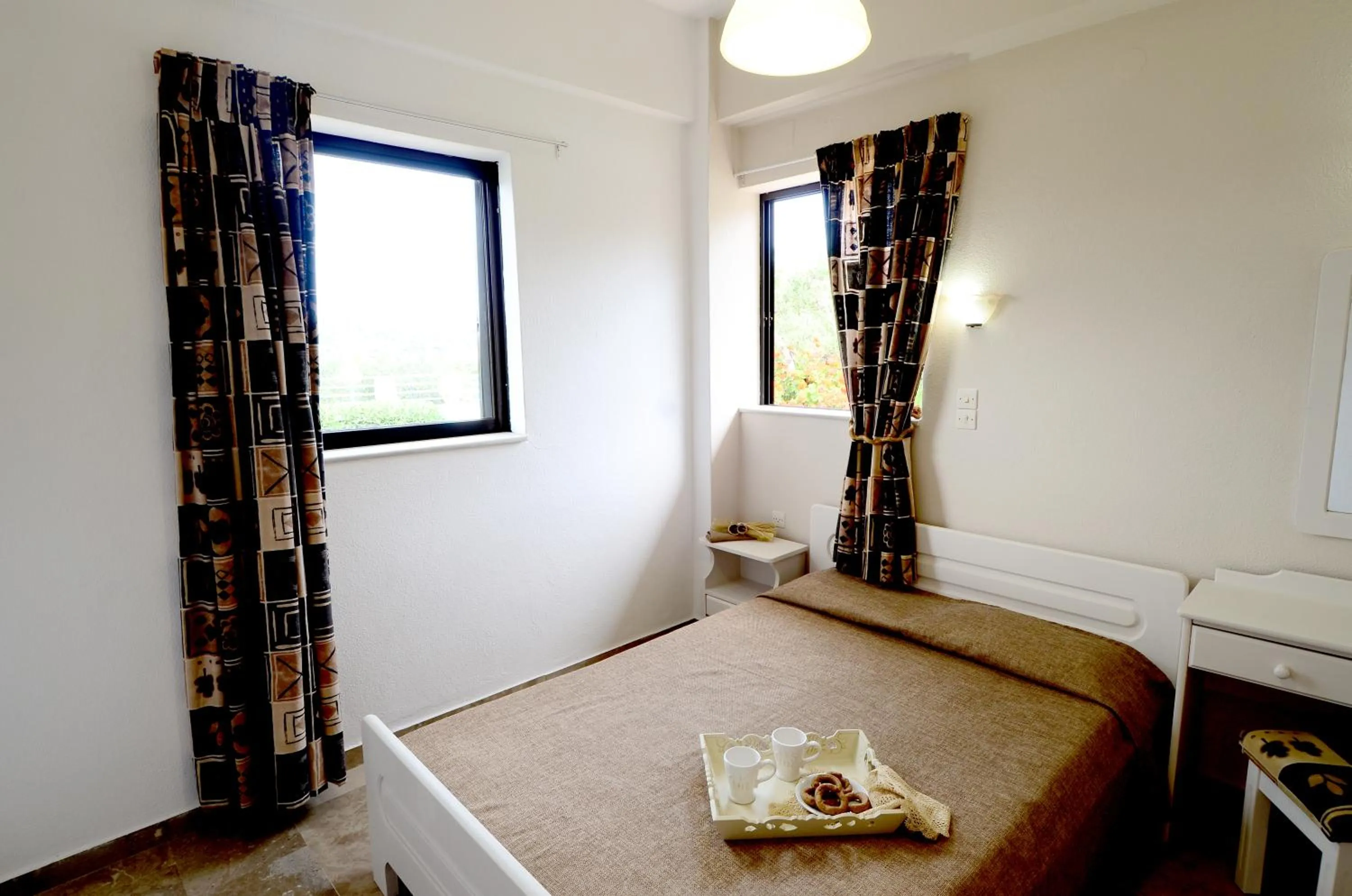 Bed in Golden Apartments