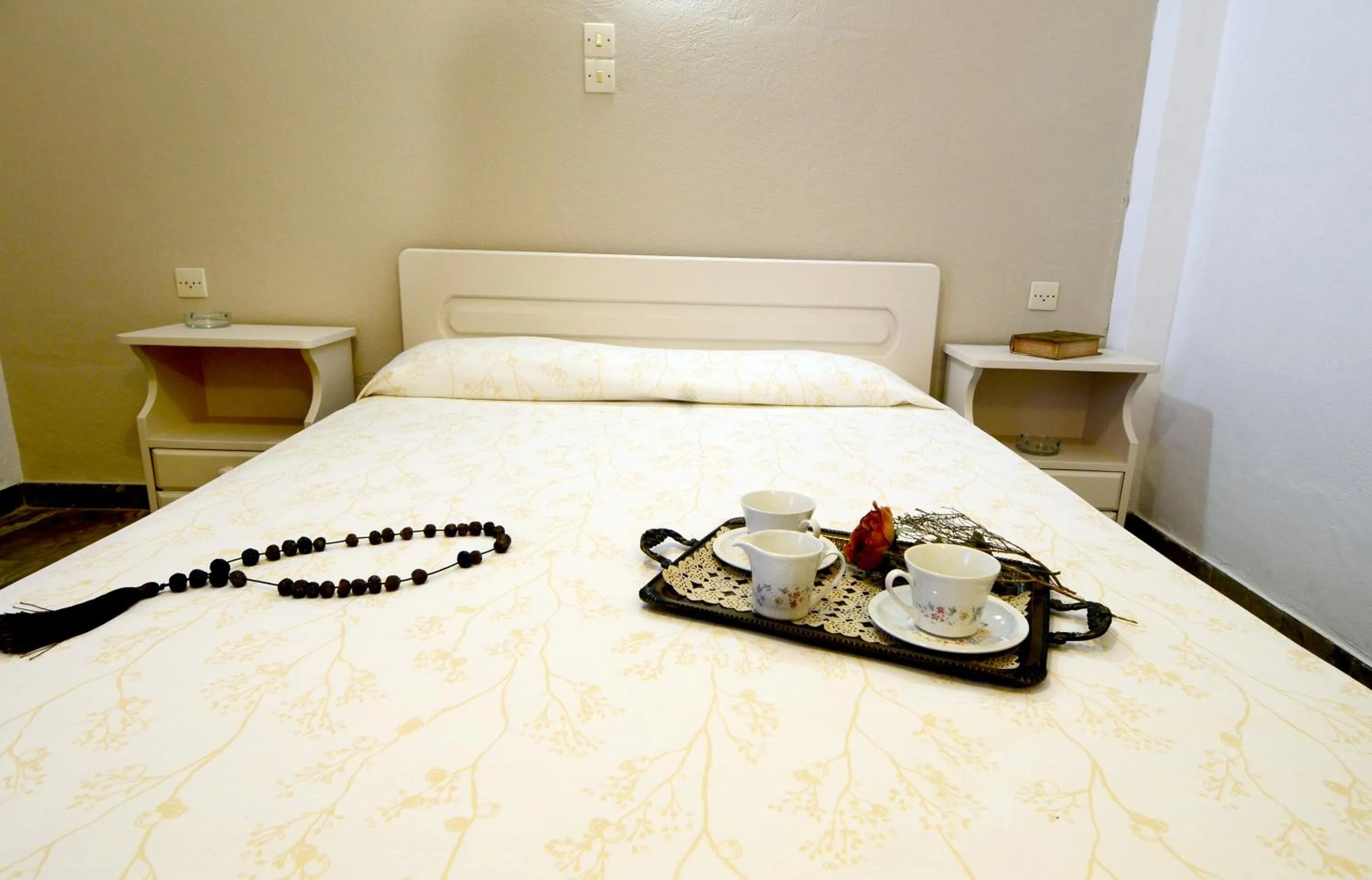 Bed in Golden Apartments