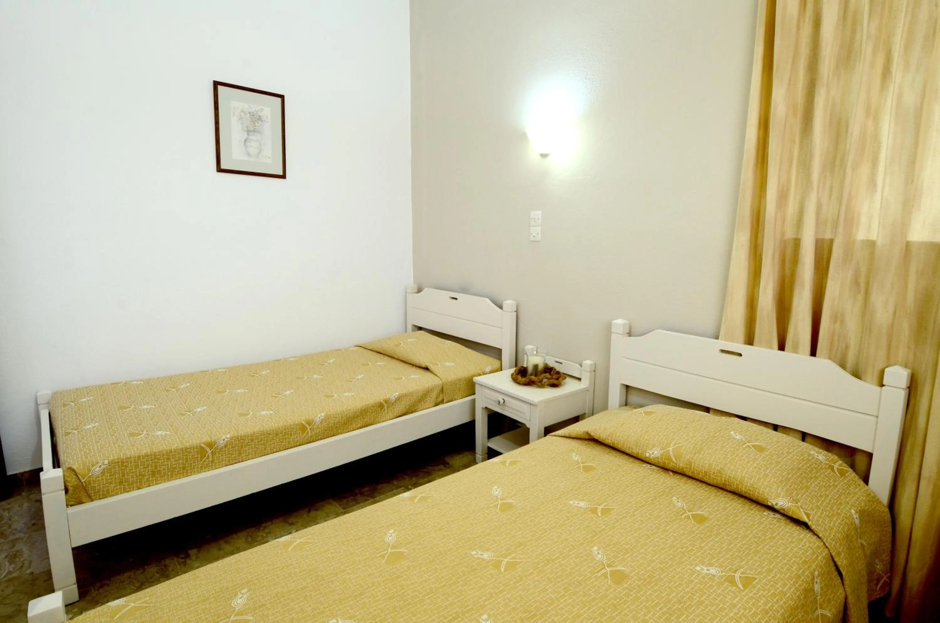 Bed in Golden Apartments