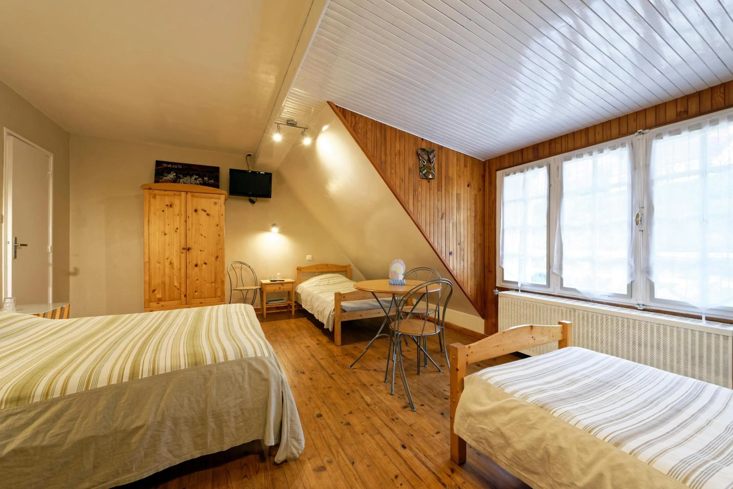 Bed in Chambres d'hotes à Autun