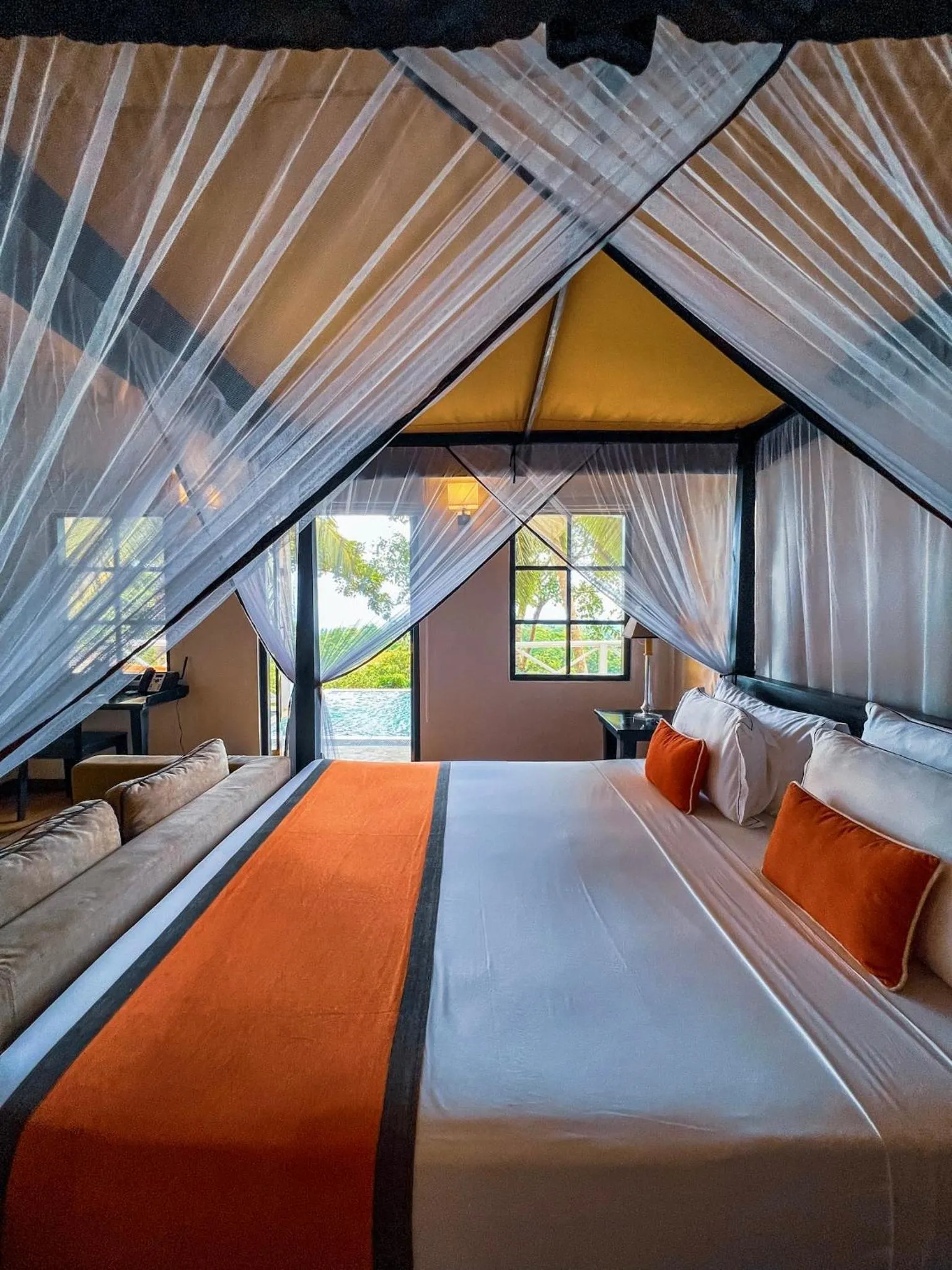 Bed in Tabula Rasa Resort & Spa