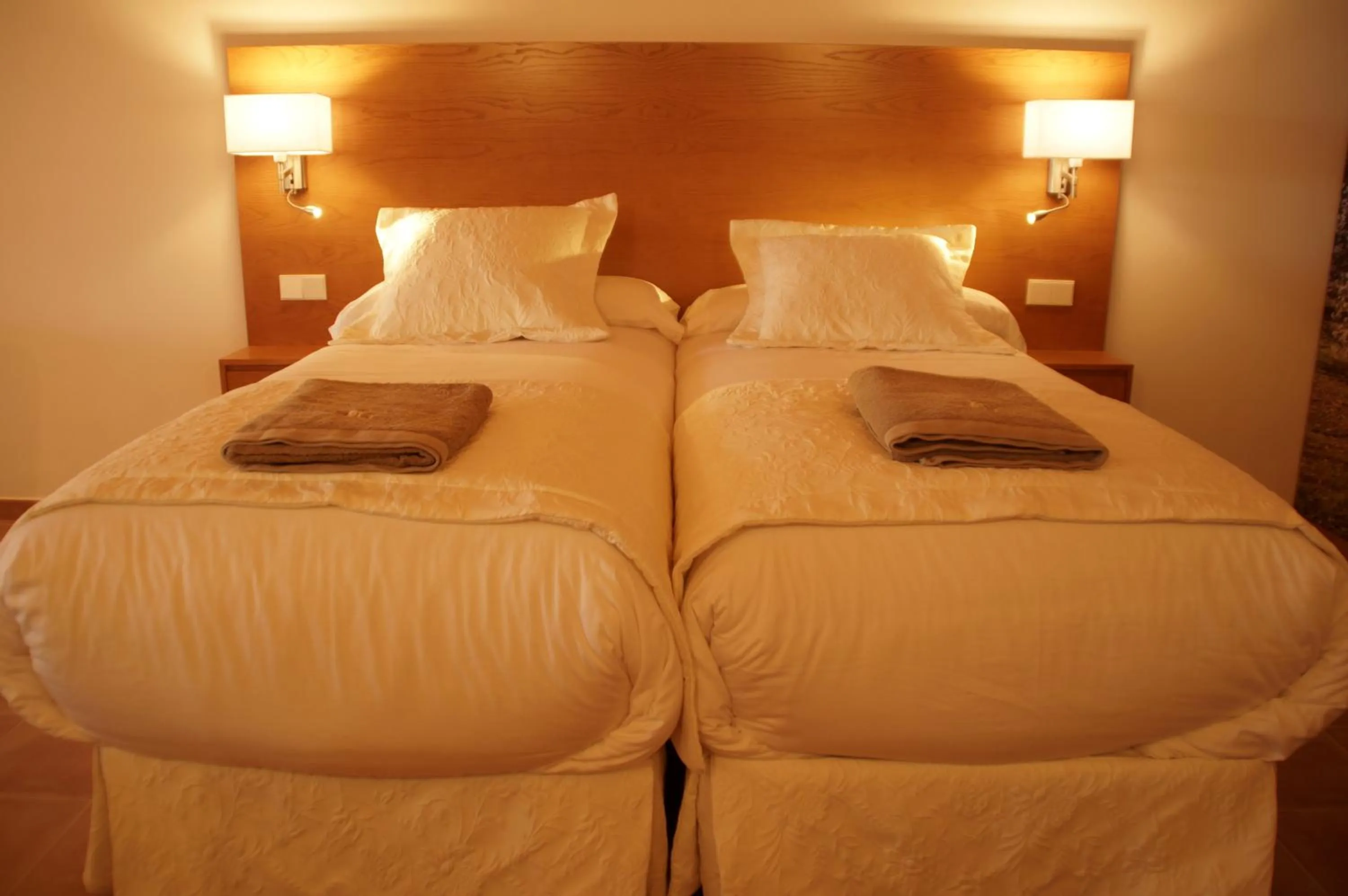 Bed in Aumallia Hotel & Spa
