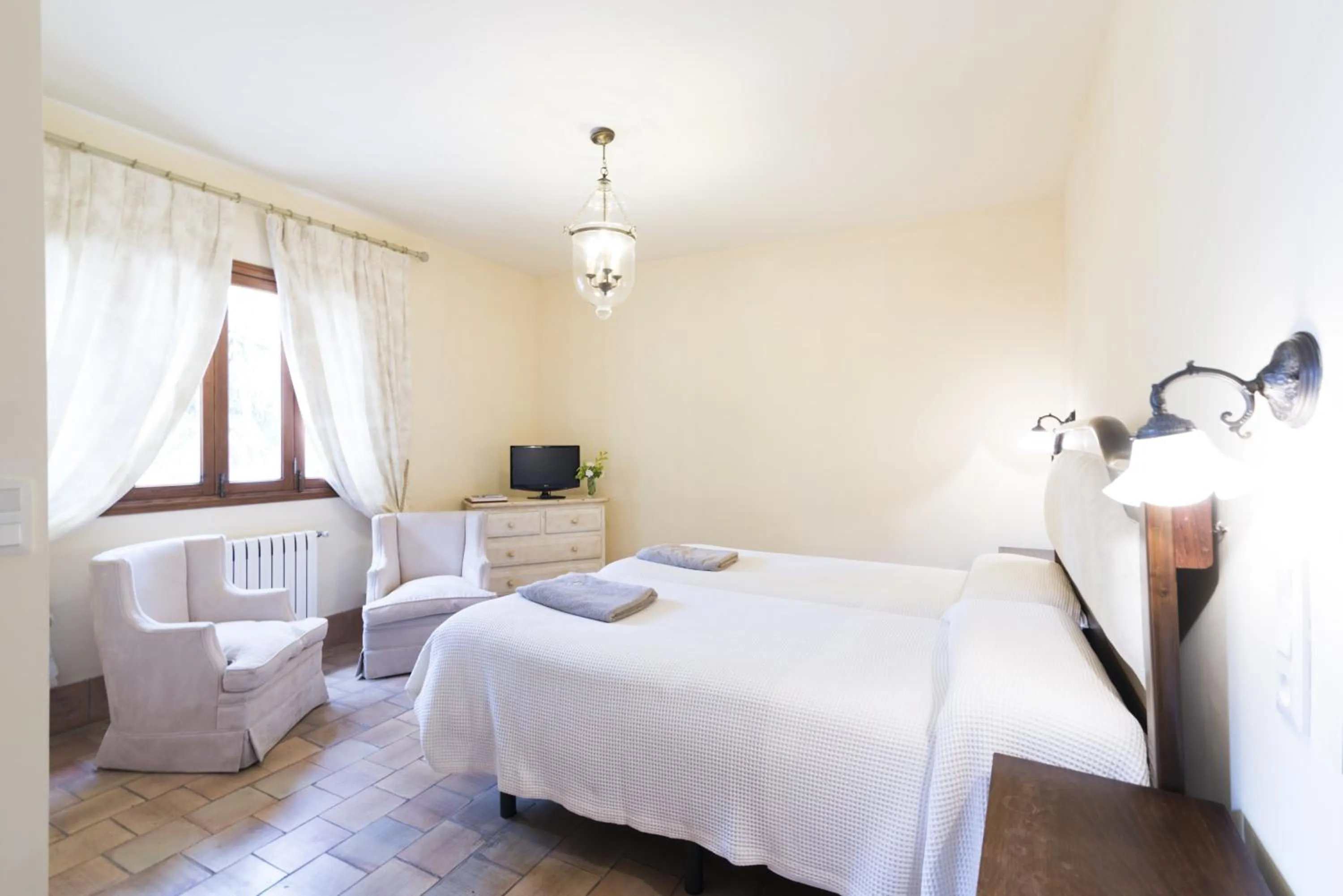 Photo of the whole room, Bed in Aumallia Hotel & Spa