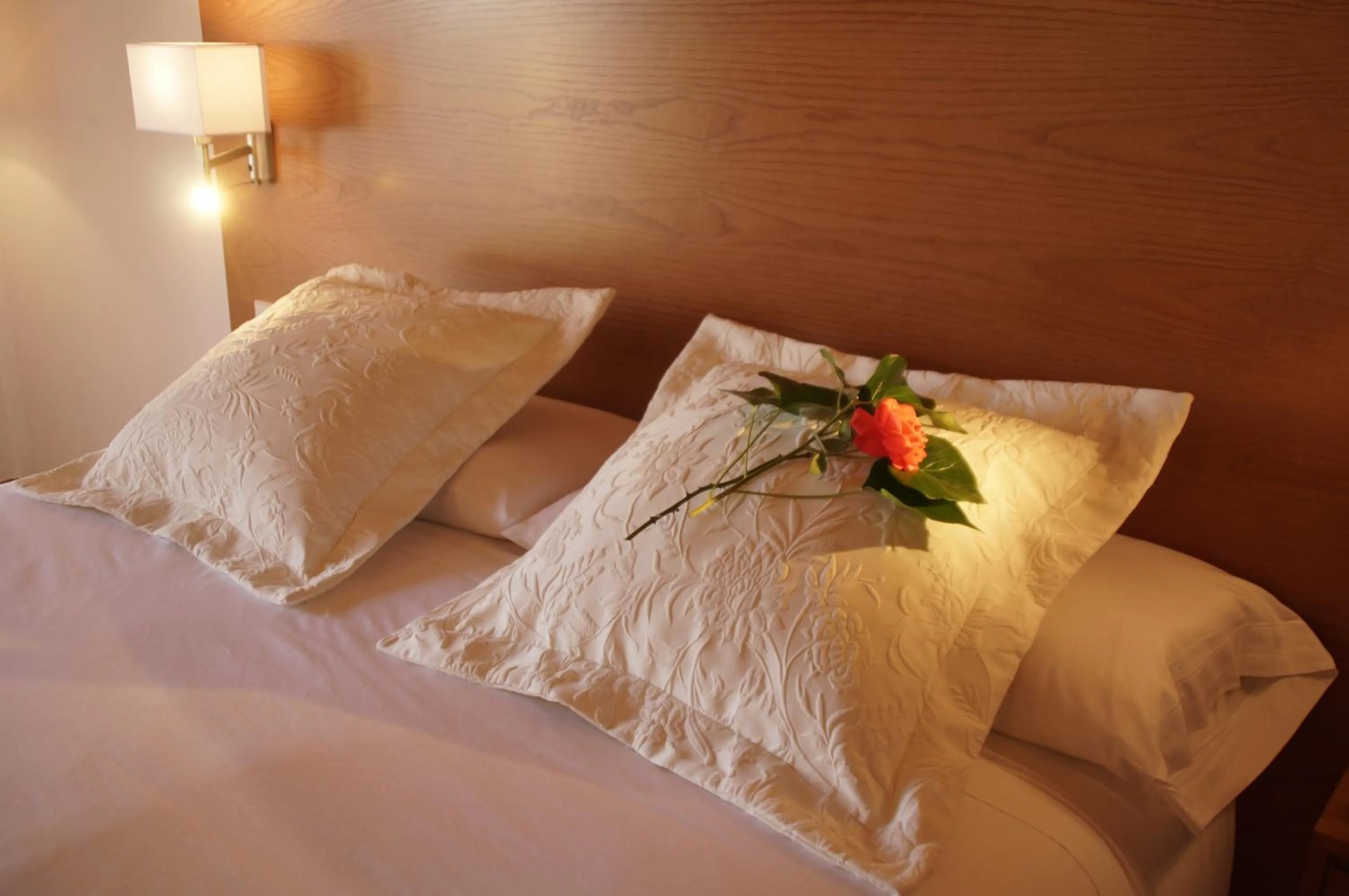 Bed in Aumallia Hotel & Spa