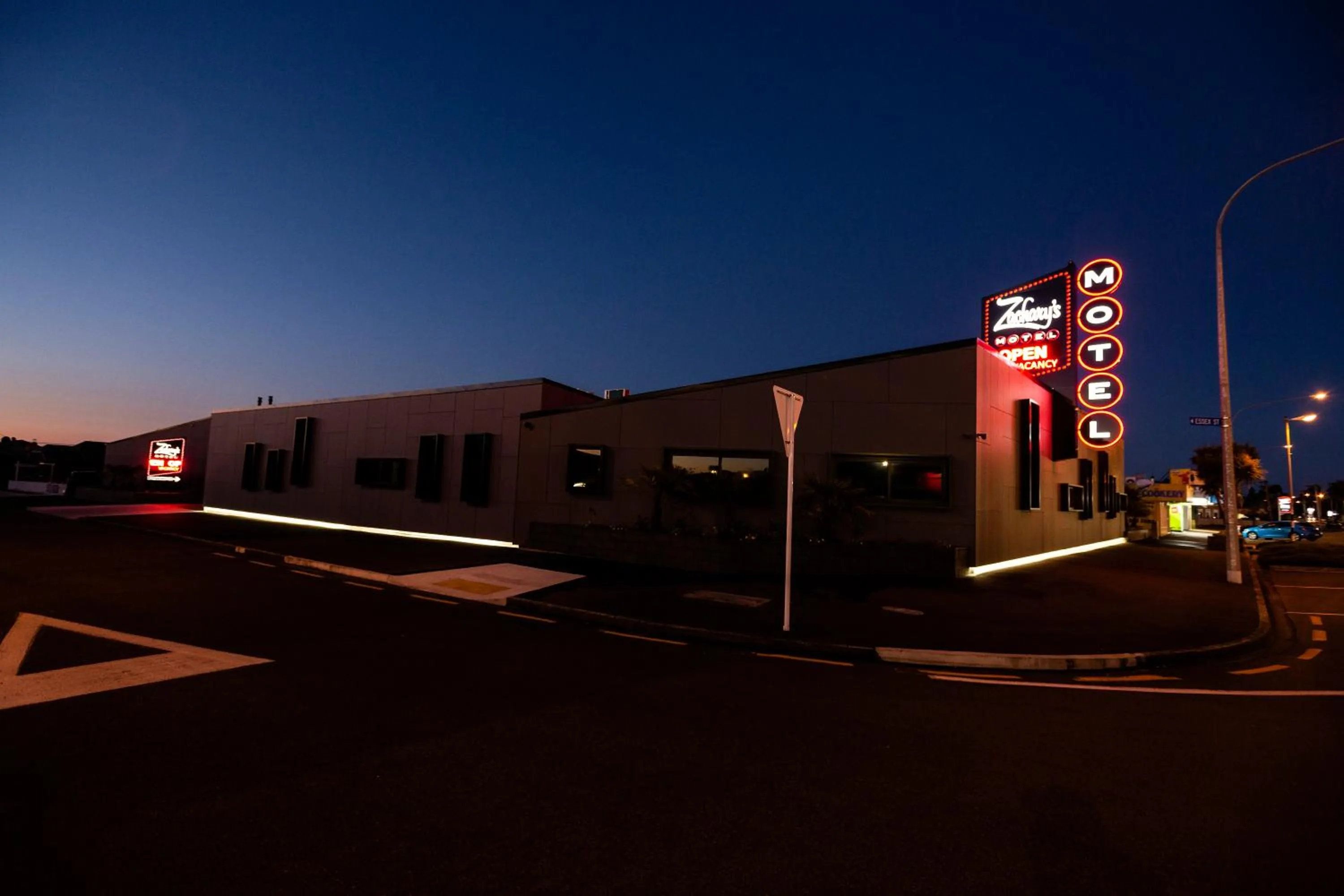 Property logo or sign in Zachary's Motel