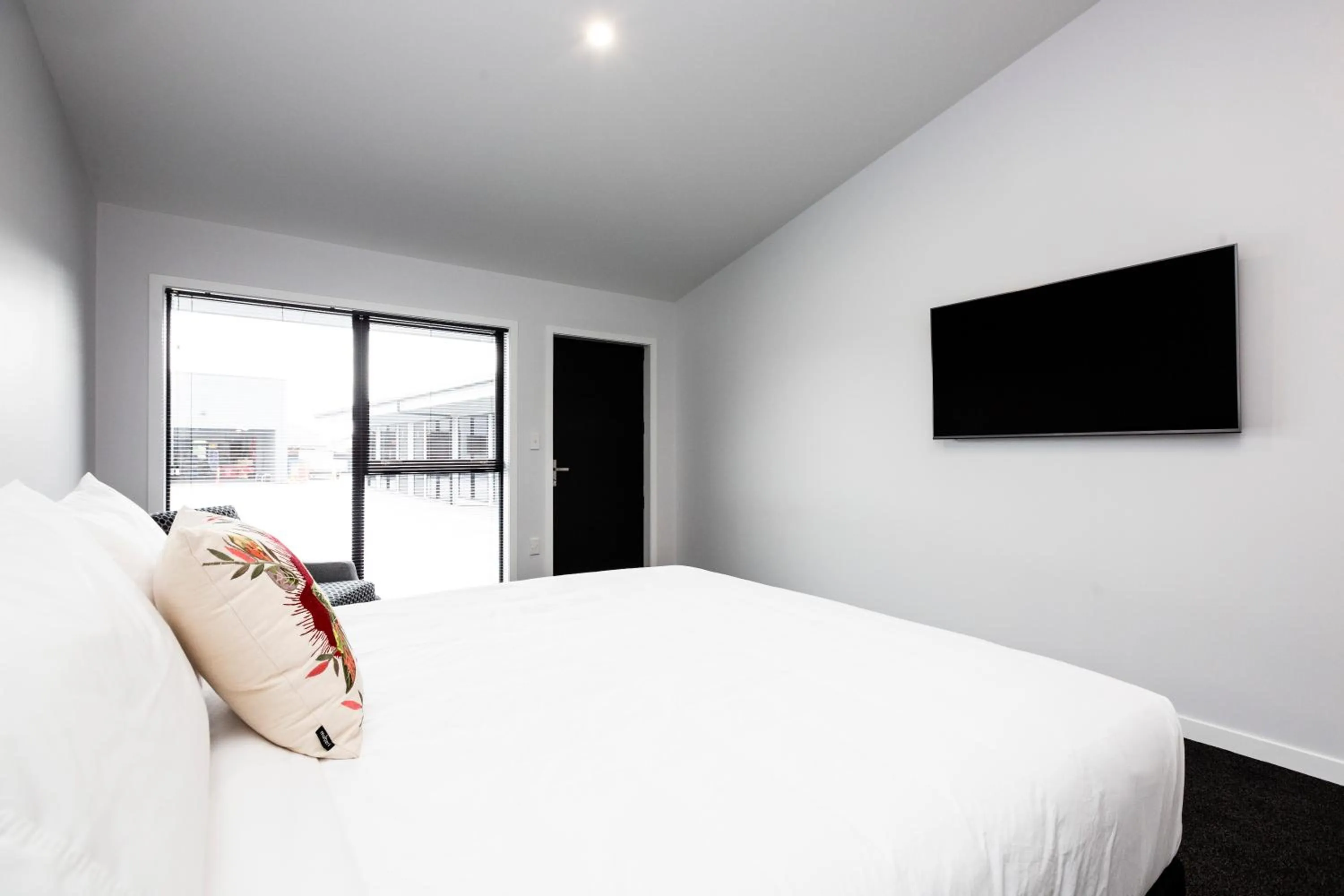 Bed in Zachary's Motel